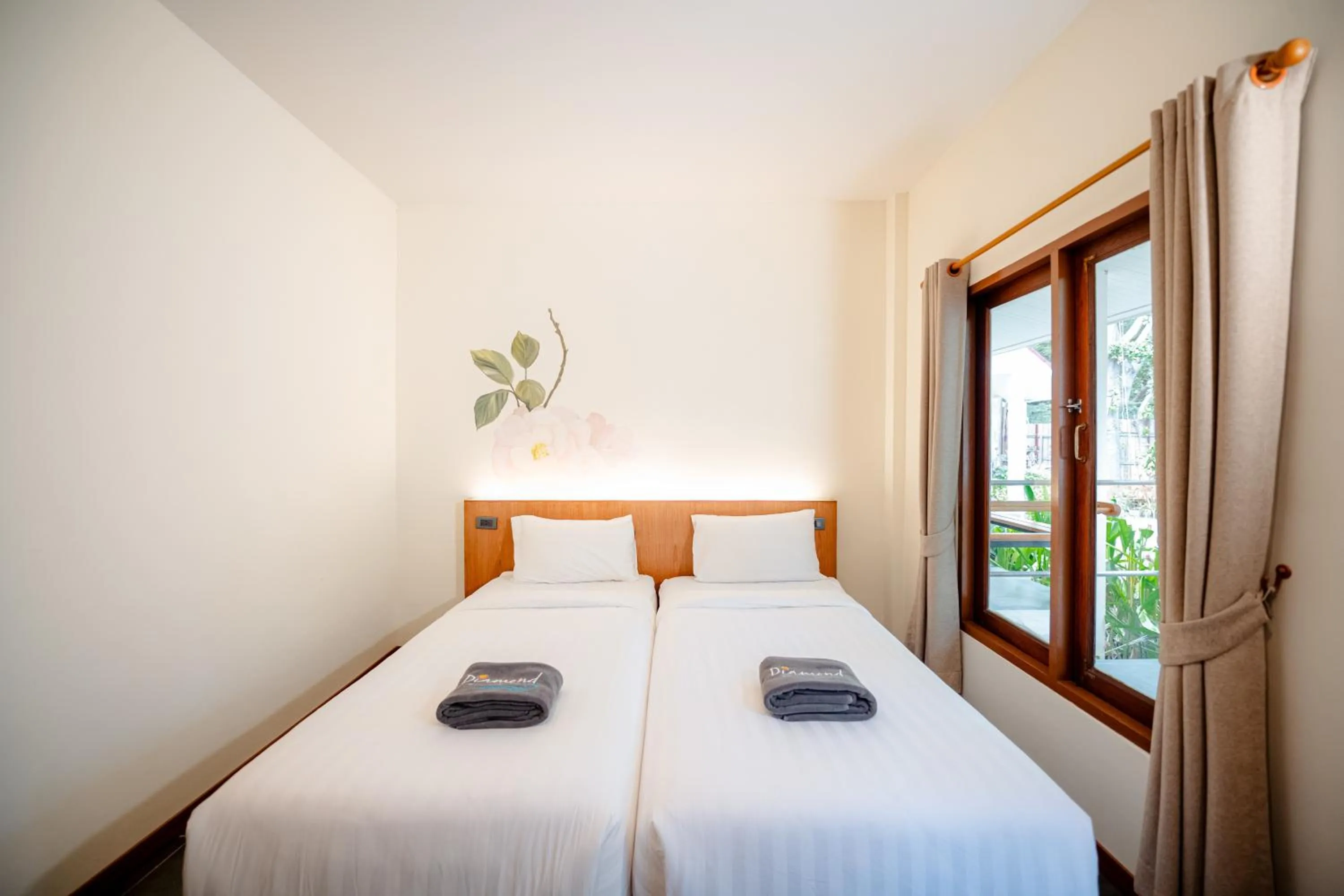 Bed in Diamond Beach Resort