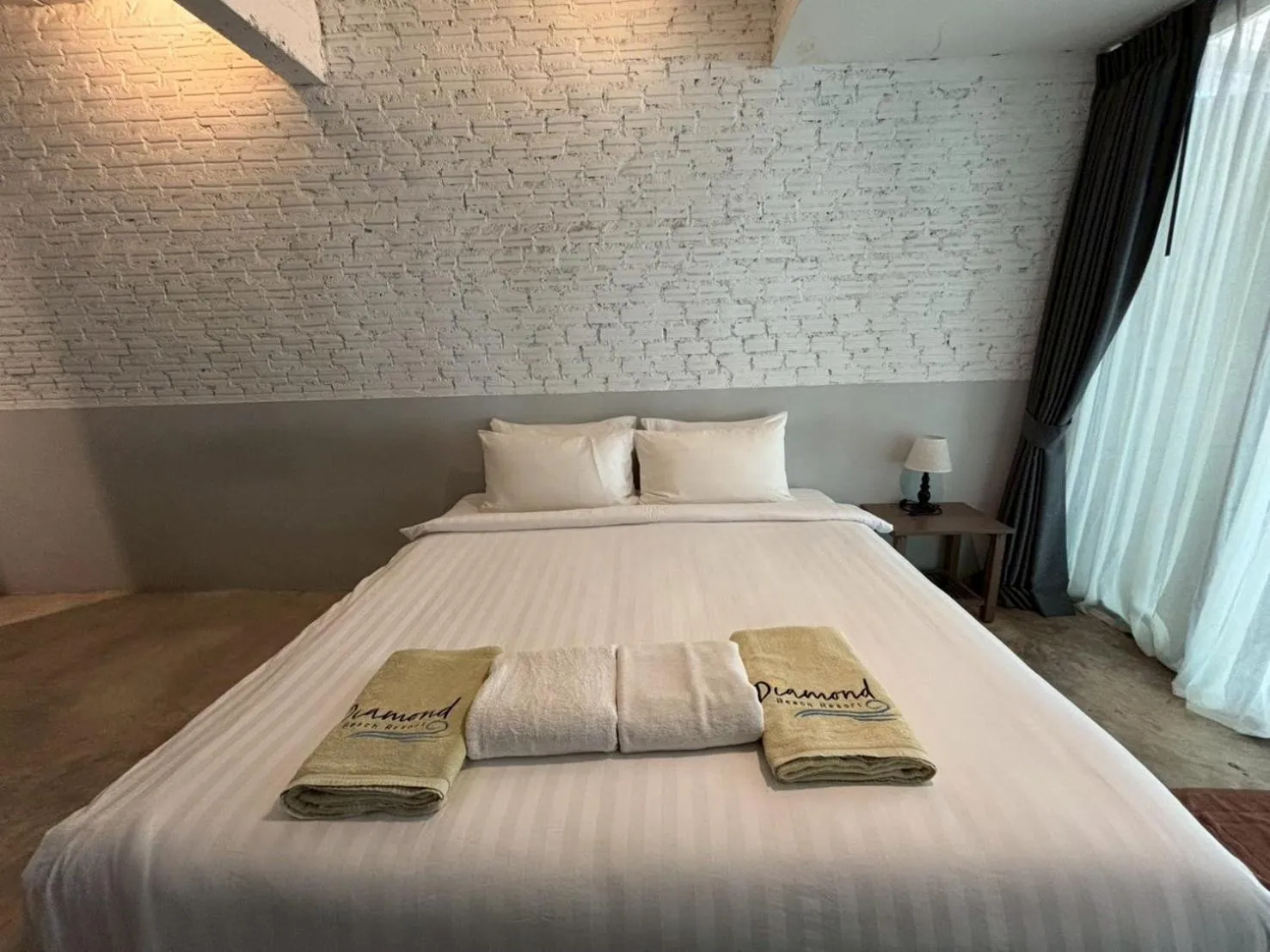 Bed in Diamond Beach Resort