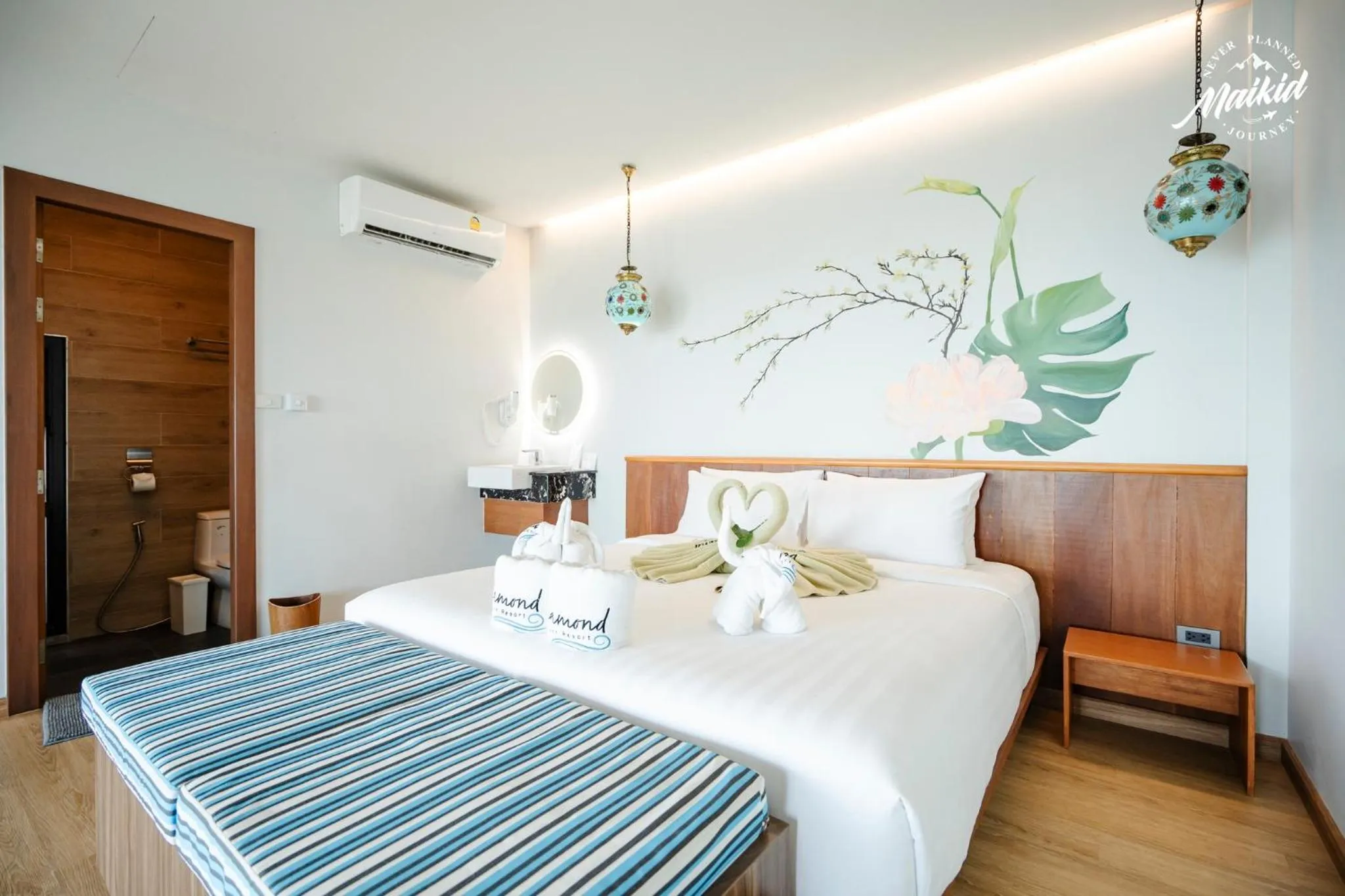 Photo of the whole room, Bed in Diamond Beach Resort