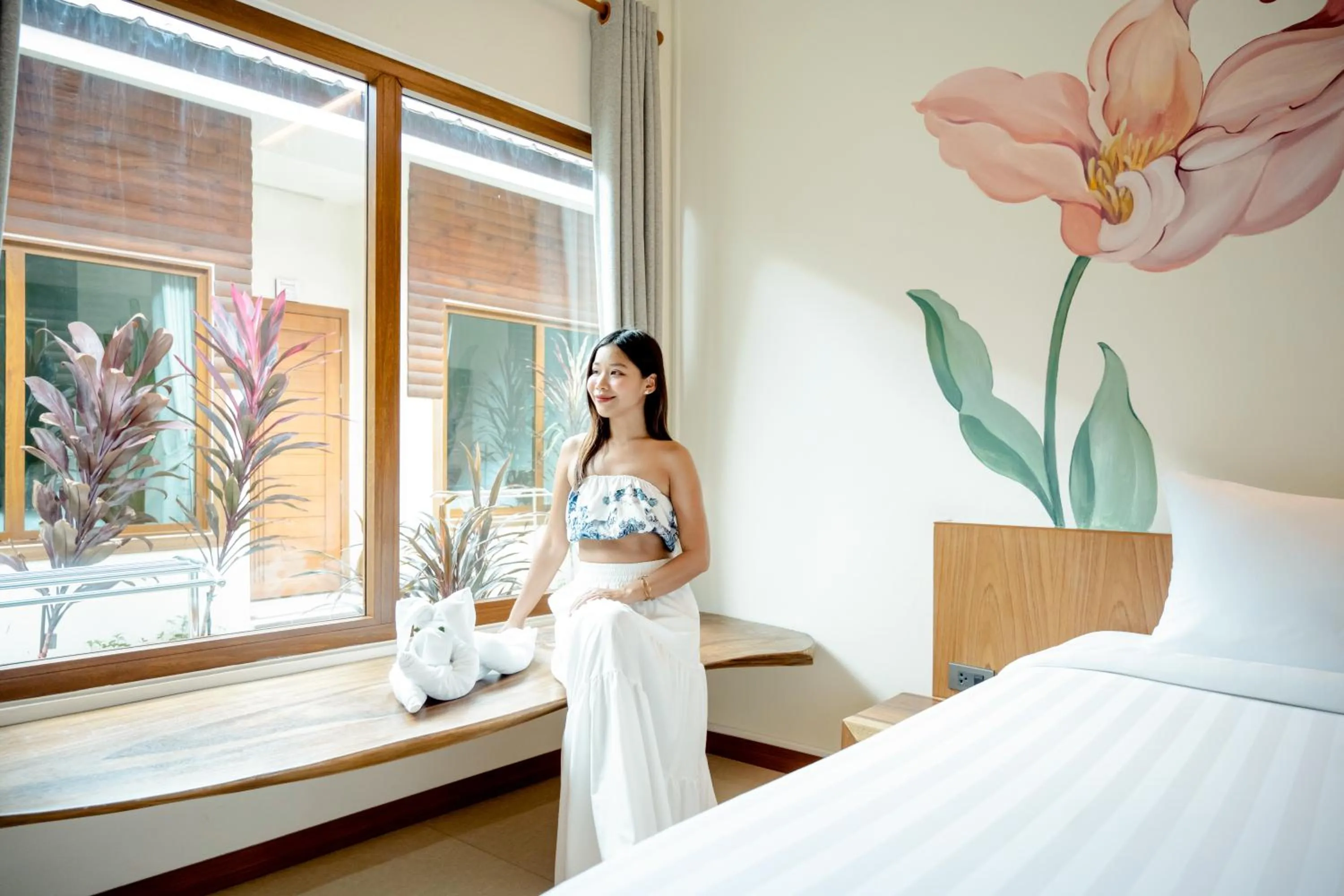 Seating area, Bed in Diamond Beach Resort