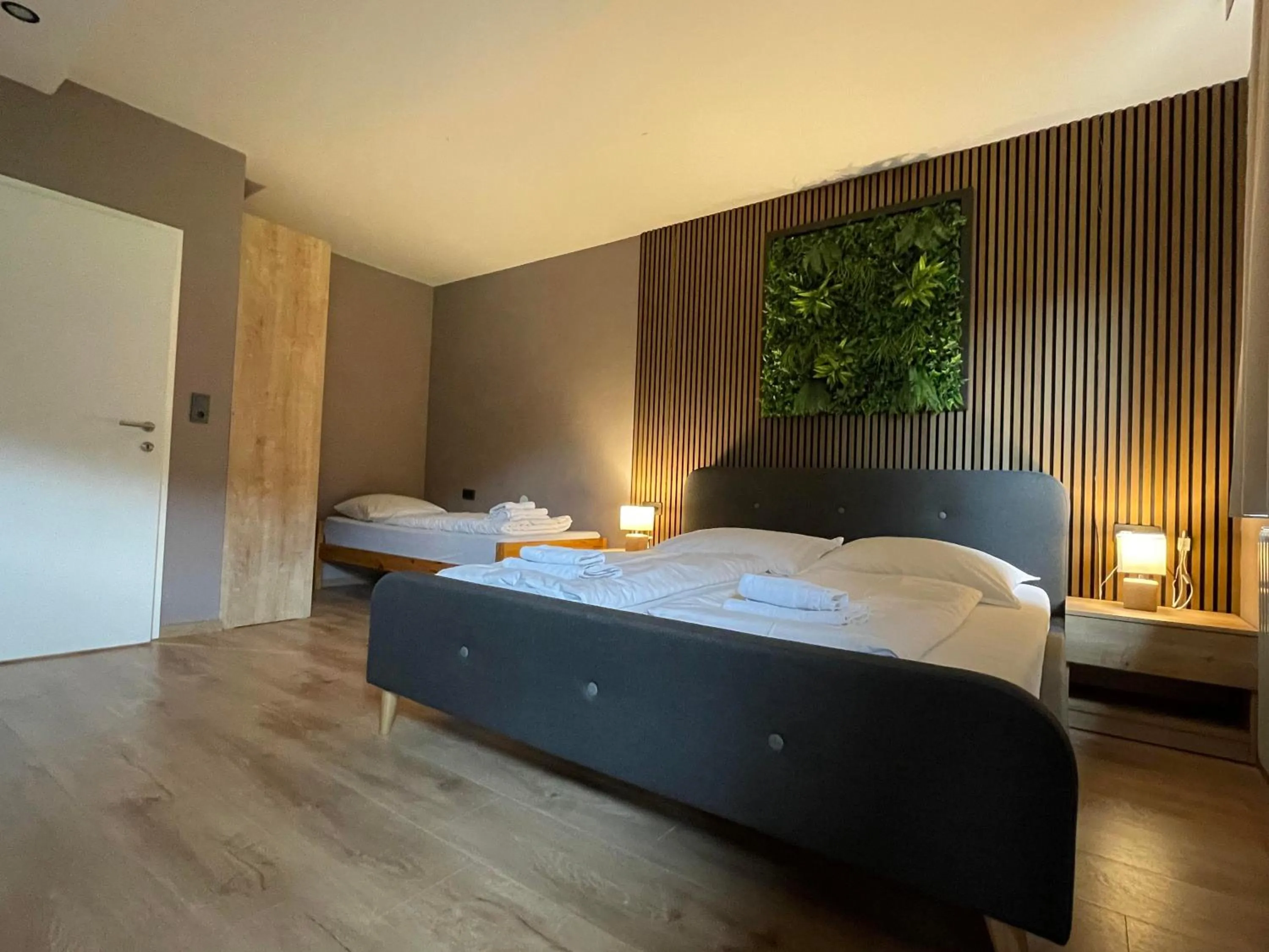 Bed in The Art and Sporthotel