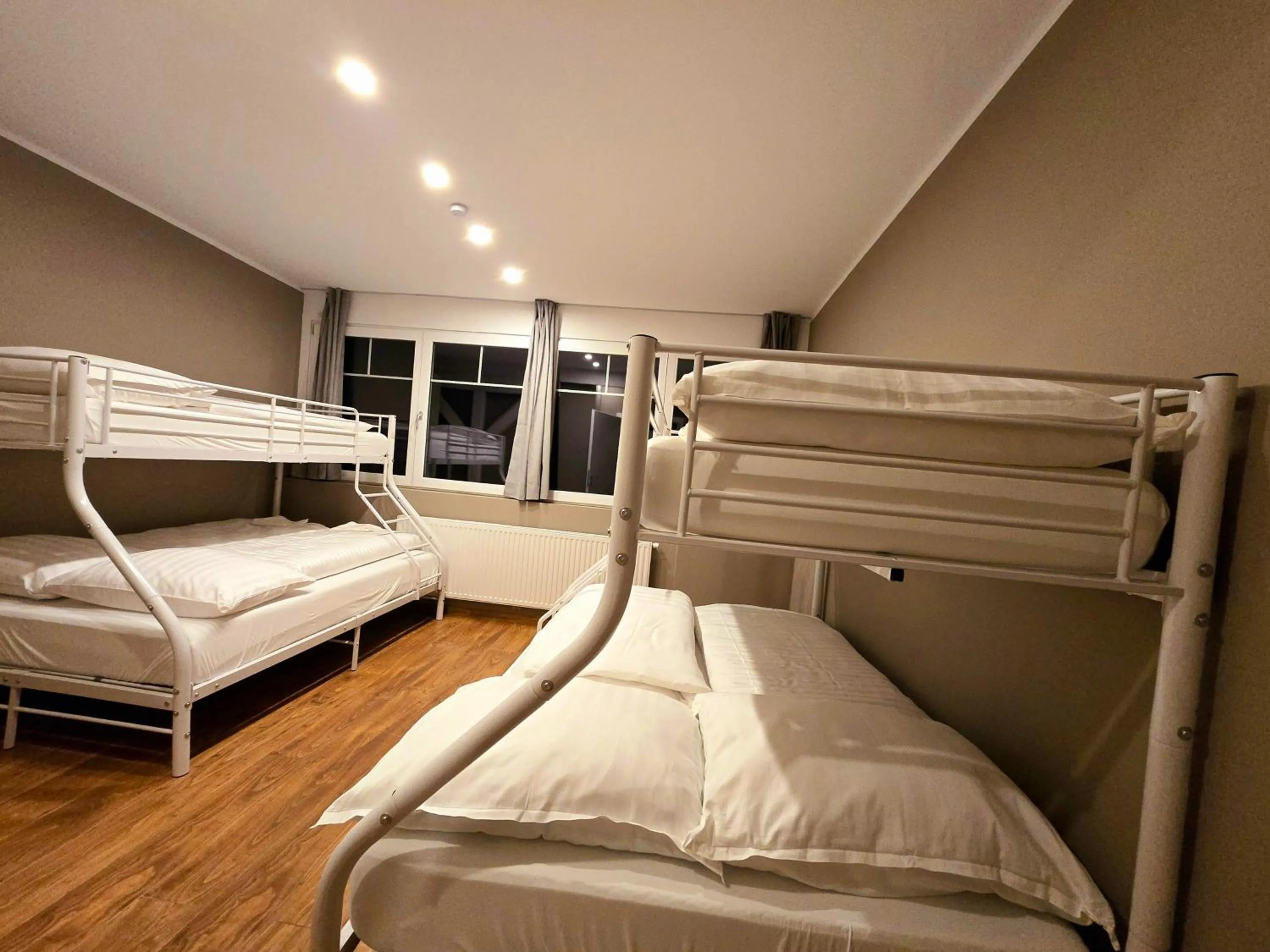 Bed in The Art and Sporthotel