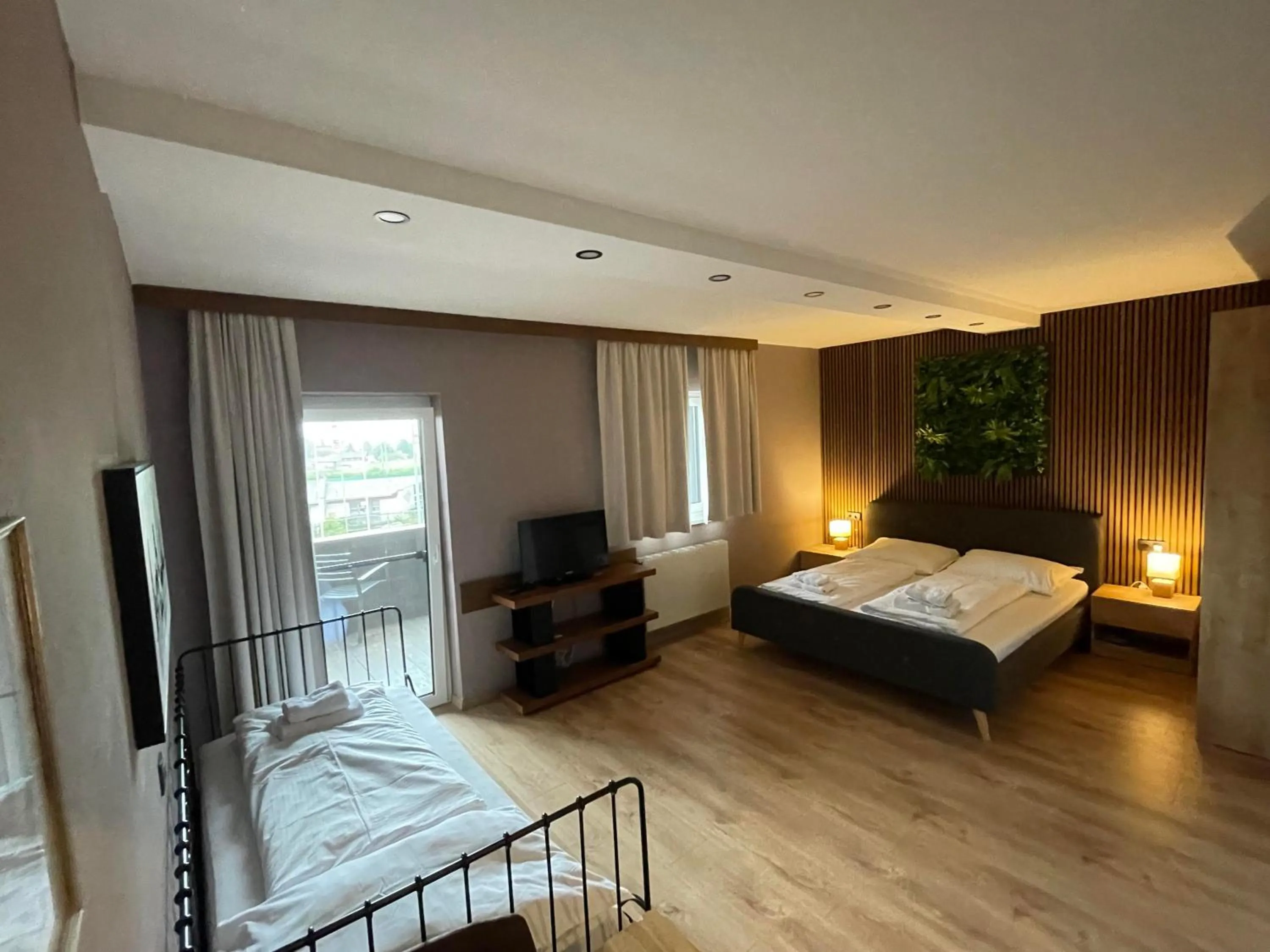 Bed in The Art and Sporthotel