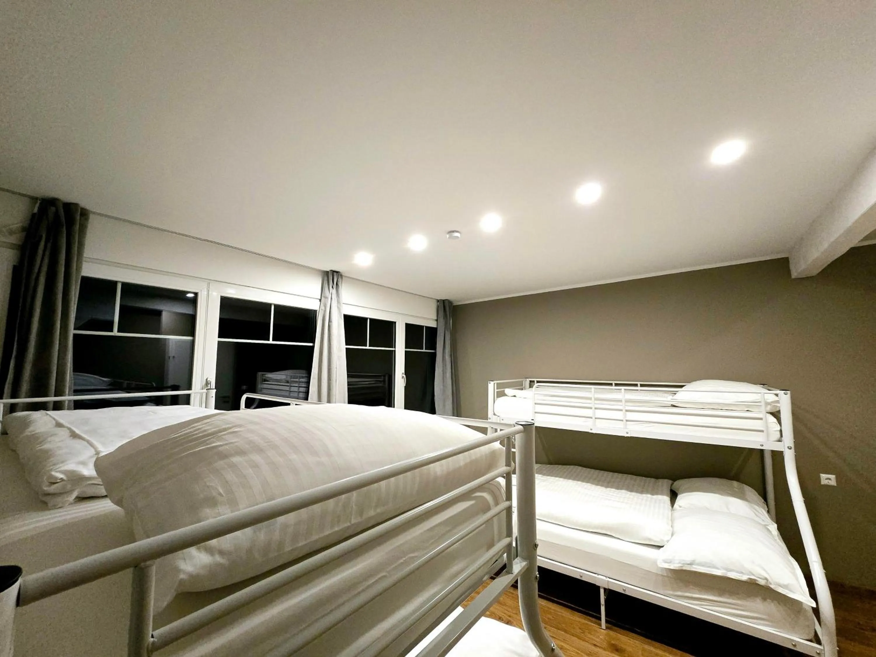 Bed in The Art and Sporthotel