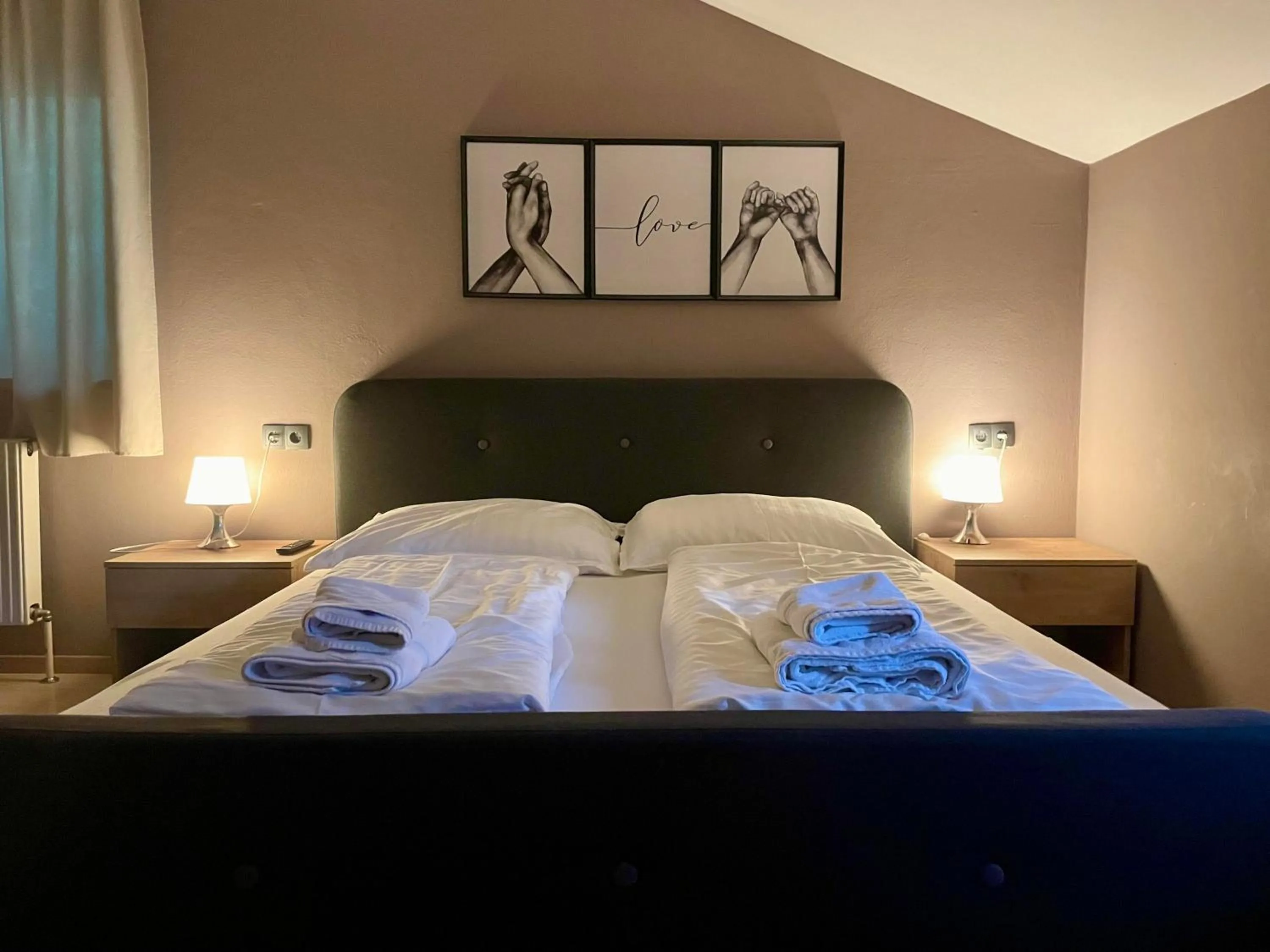 Bed in The Art and Sporthotel