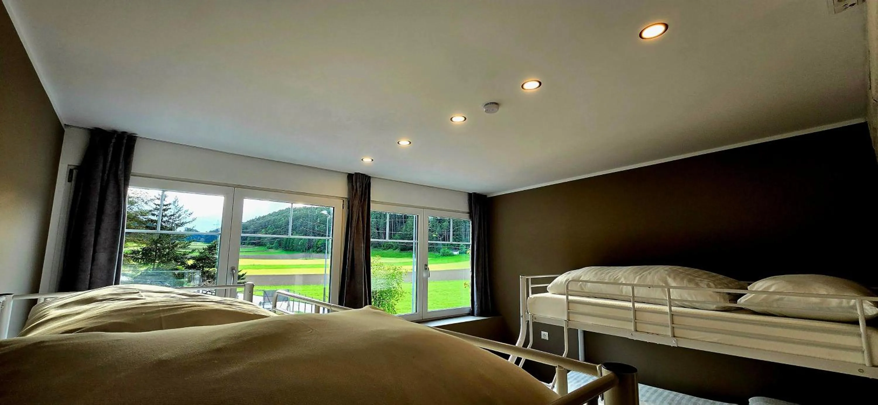 Bed in The Art and Sporthotel