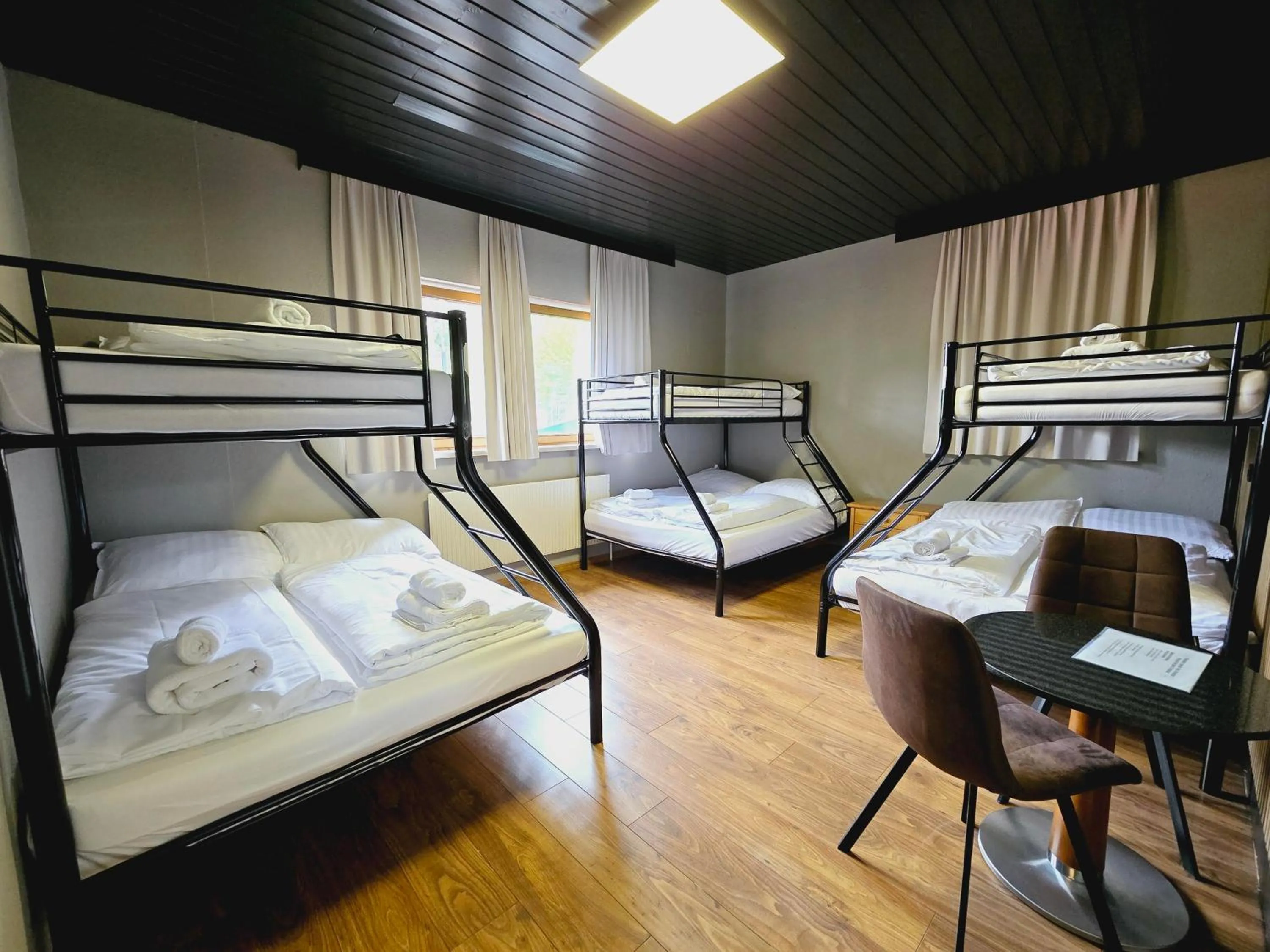 Bed in The Art and Sporthotel