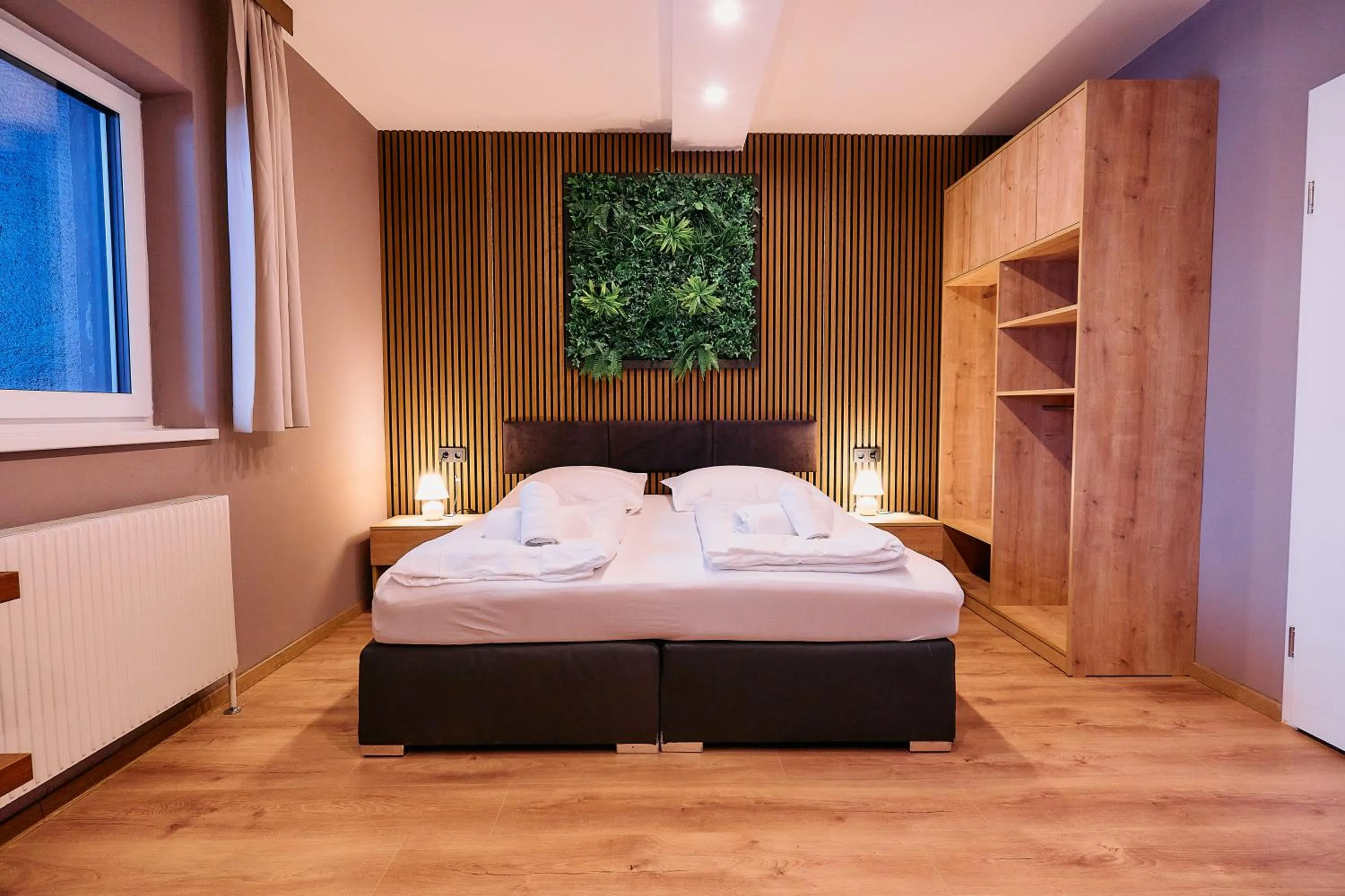 Bed in The Art and Sporthotel