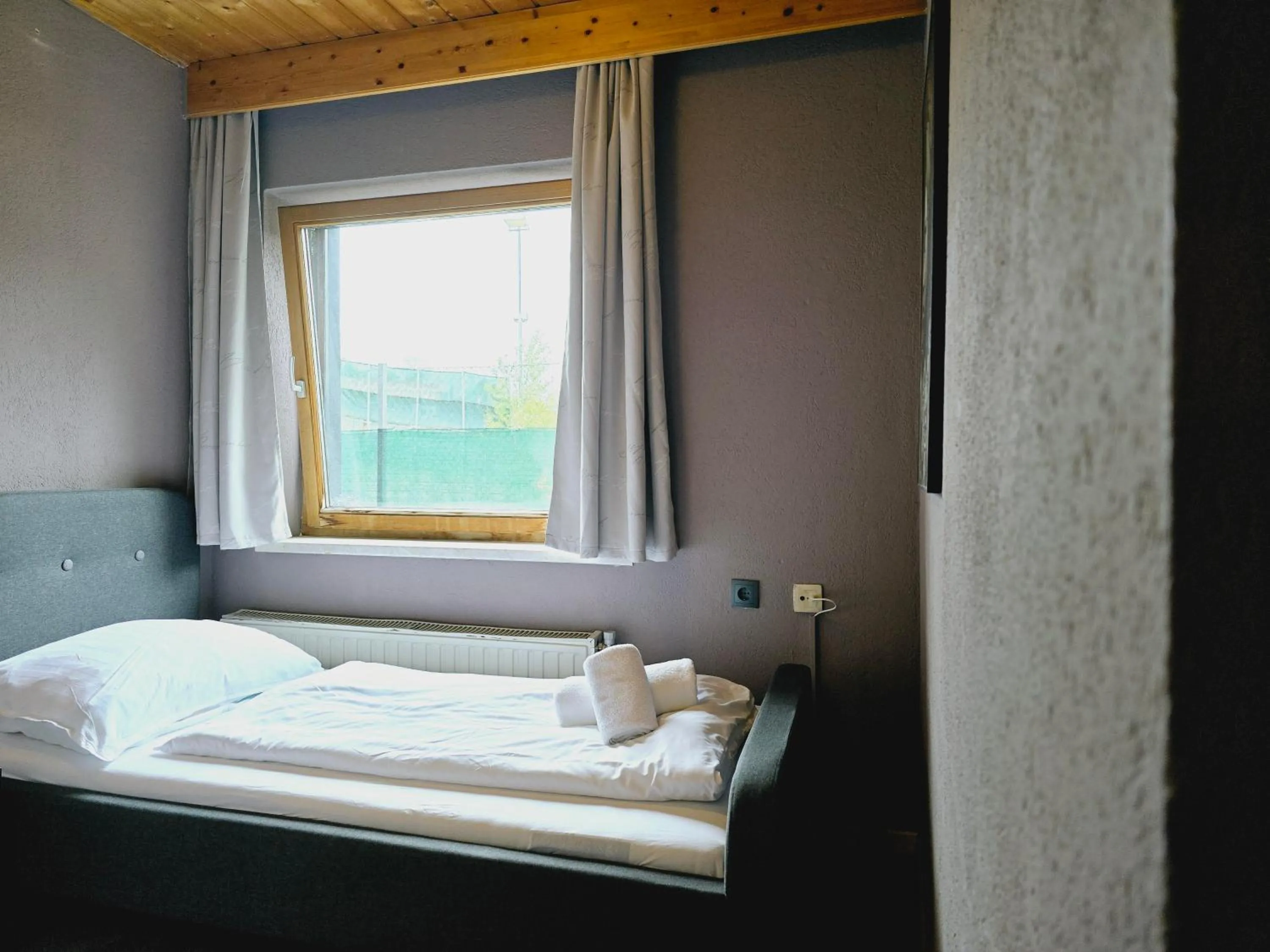 Bed in The Art and Sporthotel