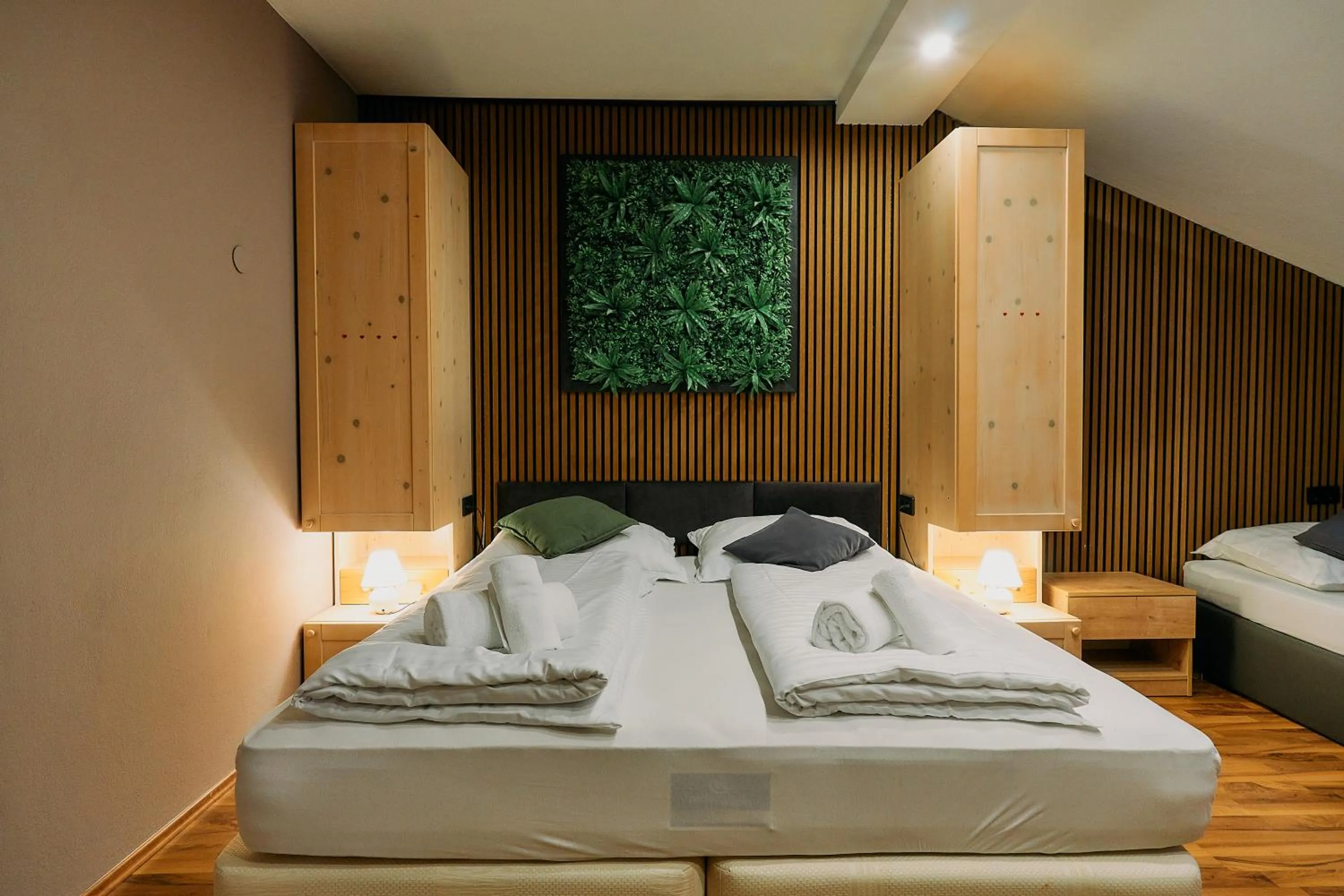 Bed in The Art and Sporthotel