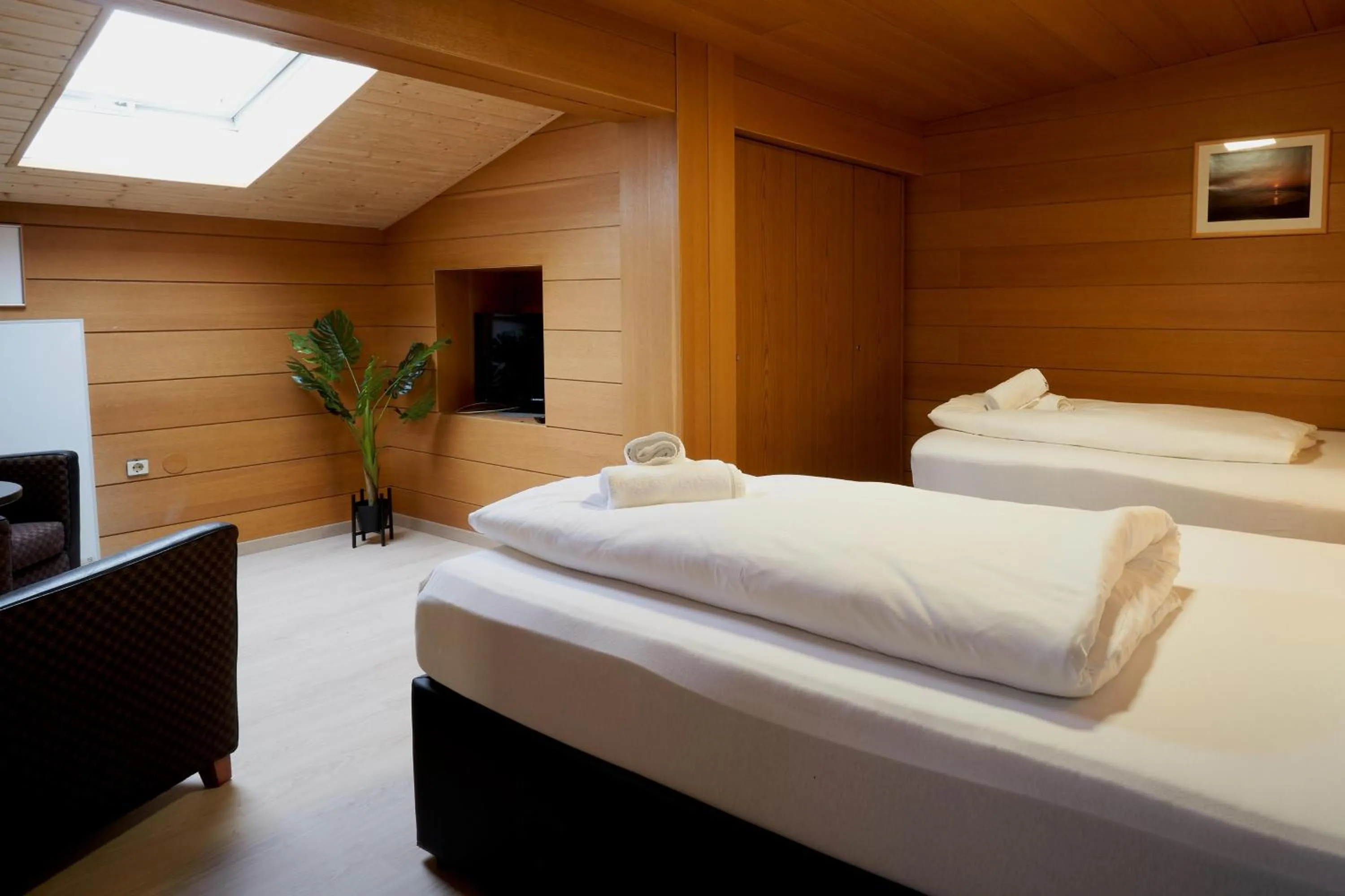 Bed in The Art and Sporthotel