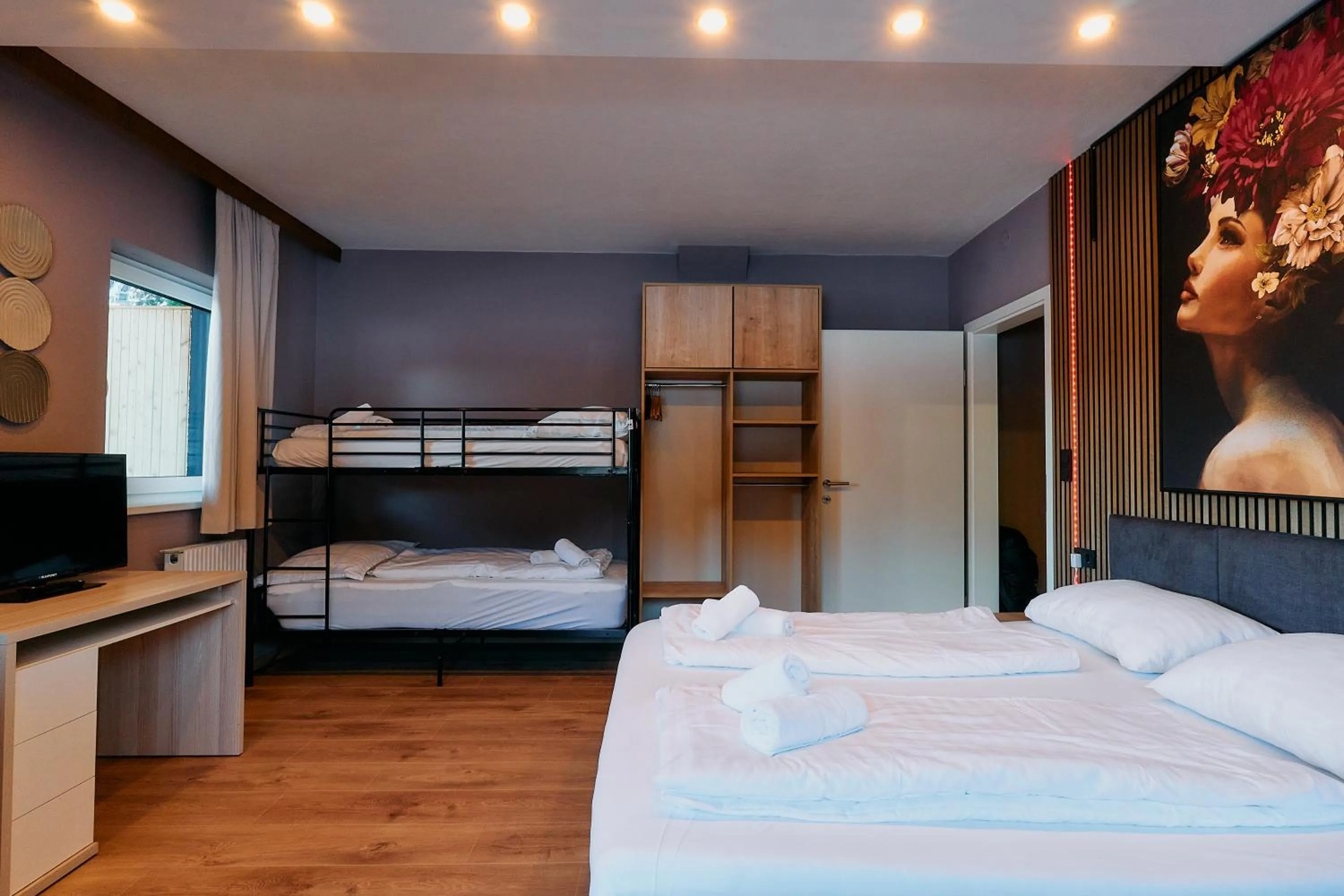 Bed in The Art and Sporthotel