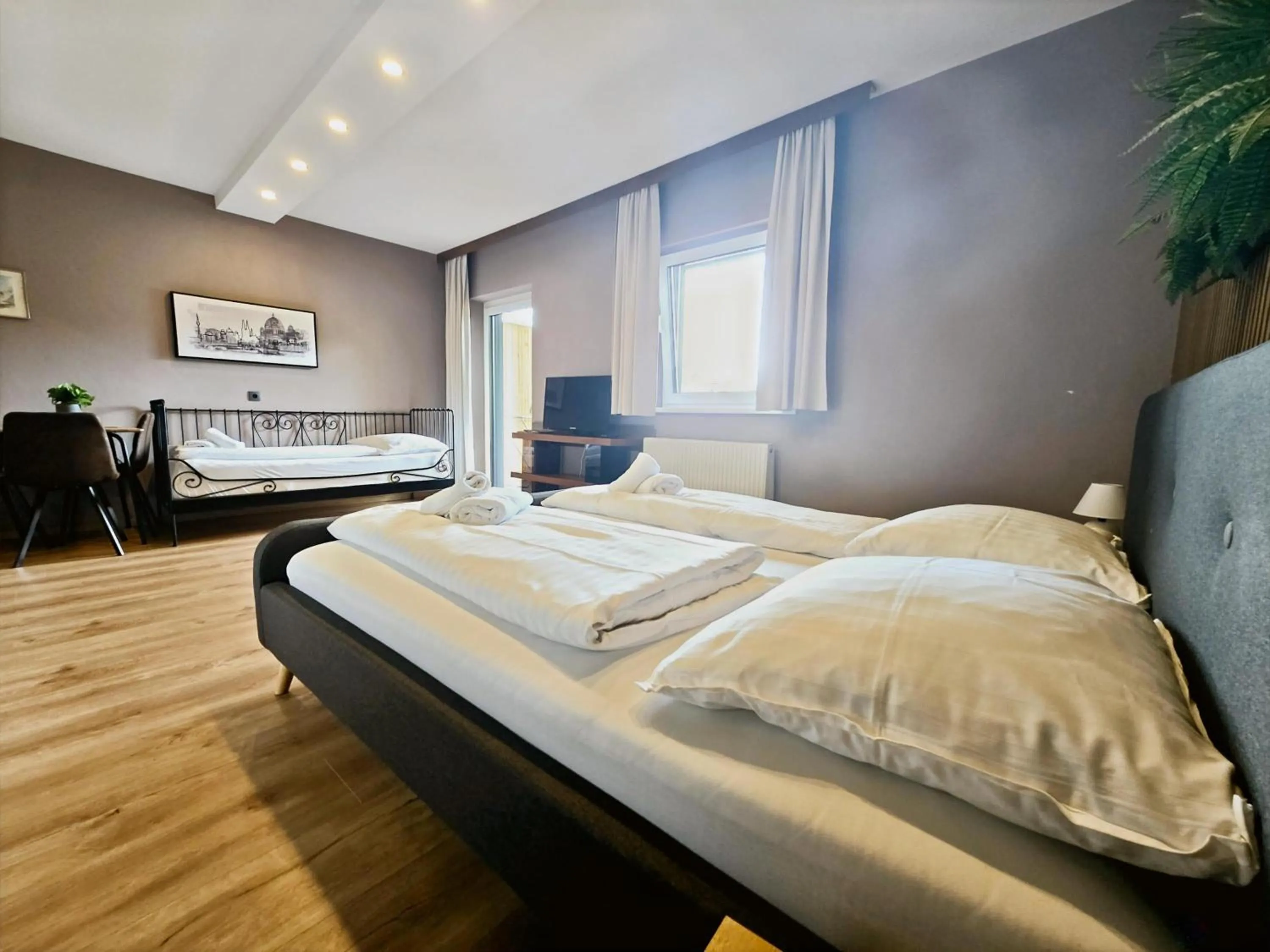 Bed in The Art and Sporthotel