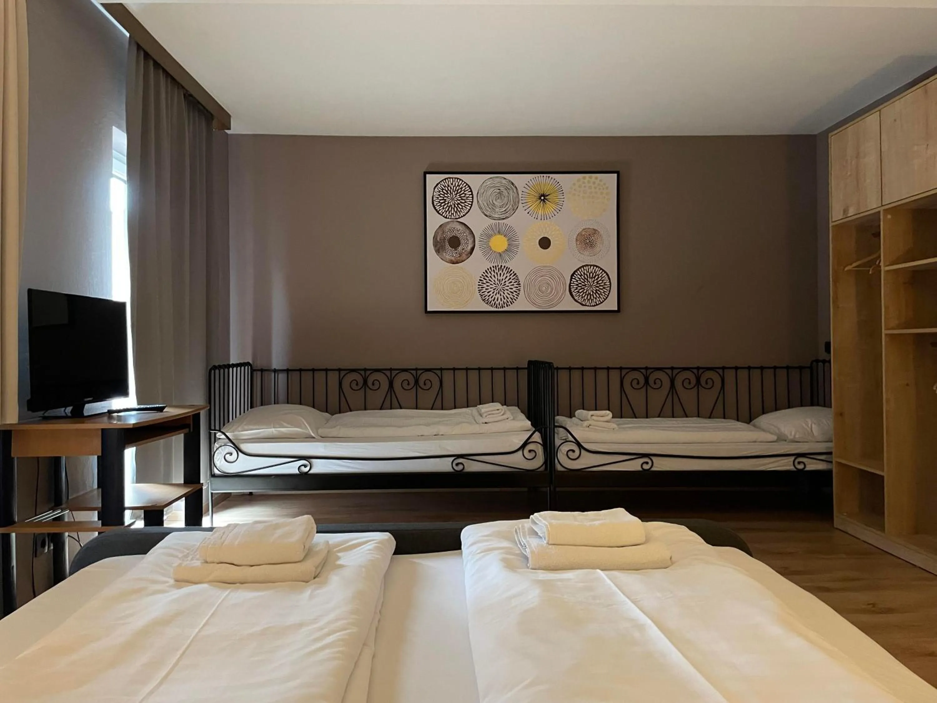 Bed in The Art and Sporthotel