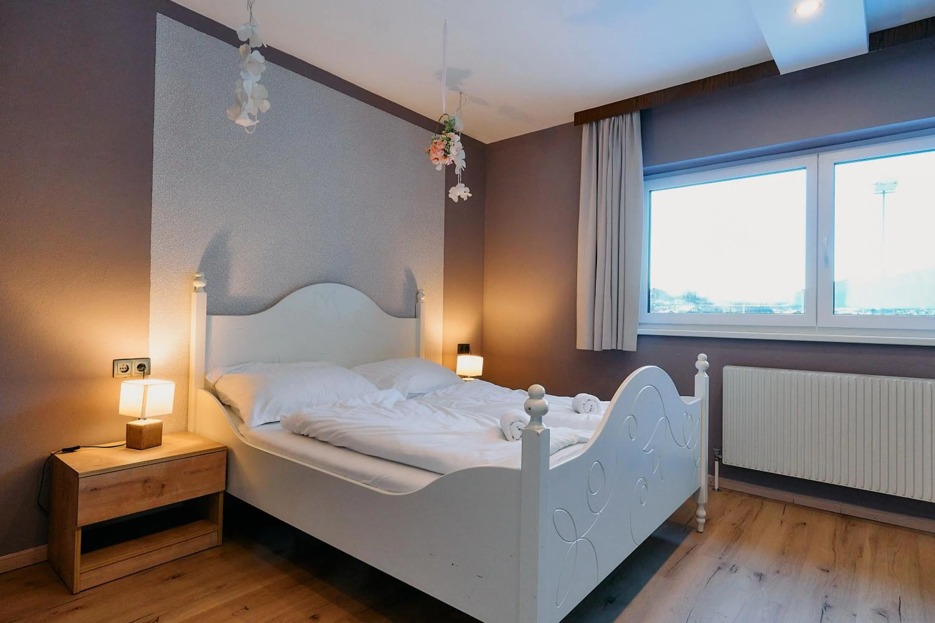 Bed in The Art and Sporthotel