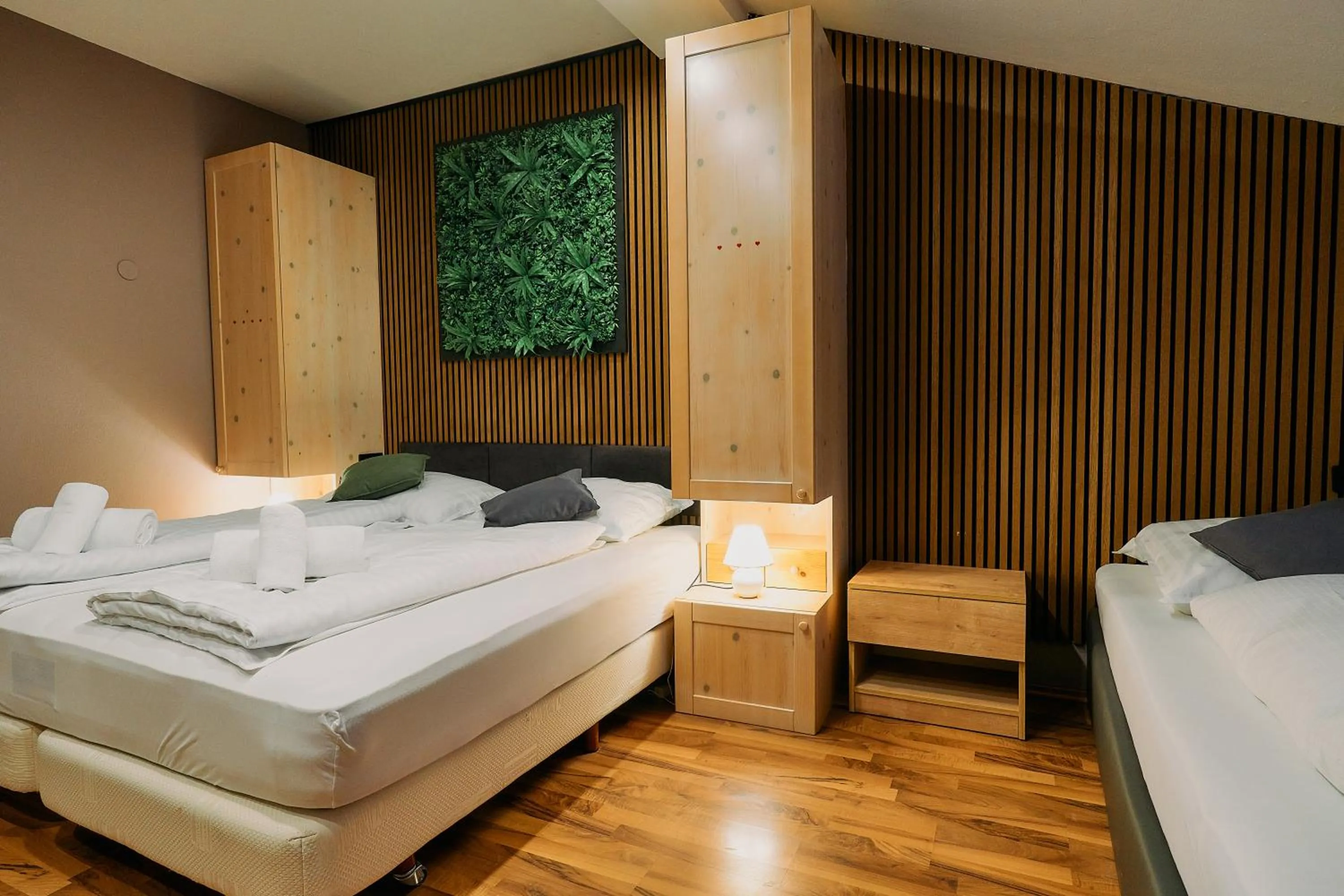 Bed in The Art and Sporthotel