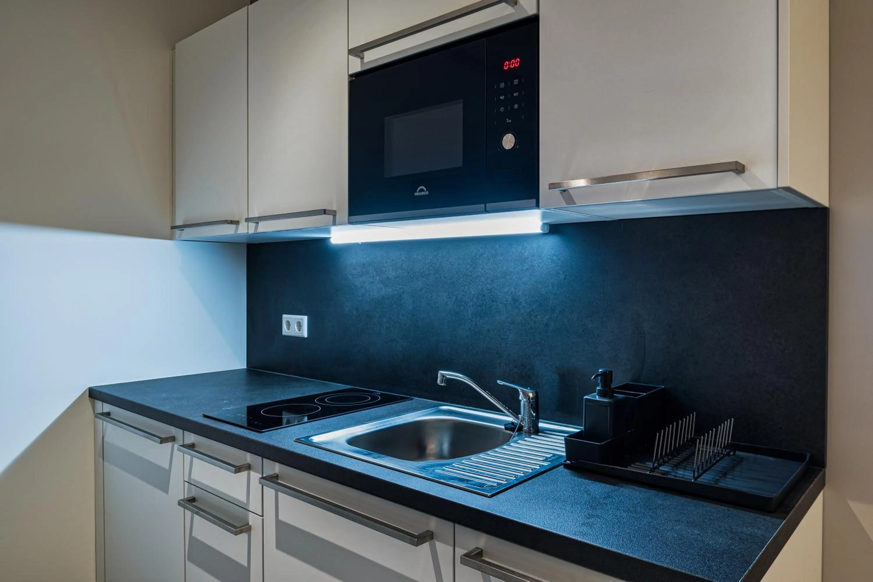 Kitchen or kitchenette in NorthApartments Dresden am Park