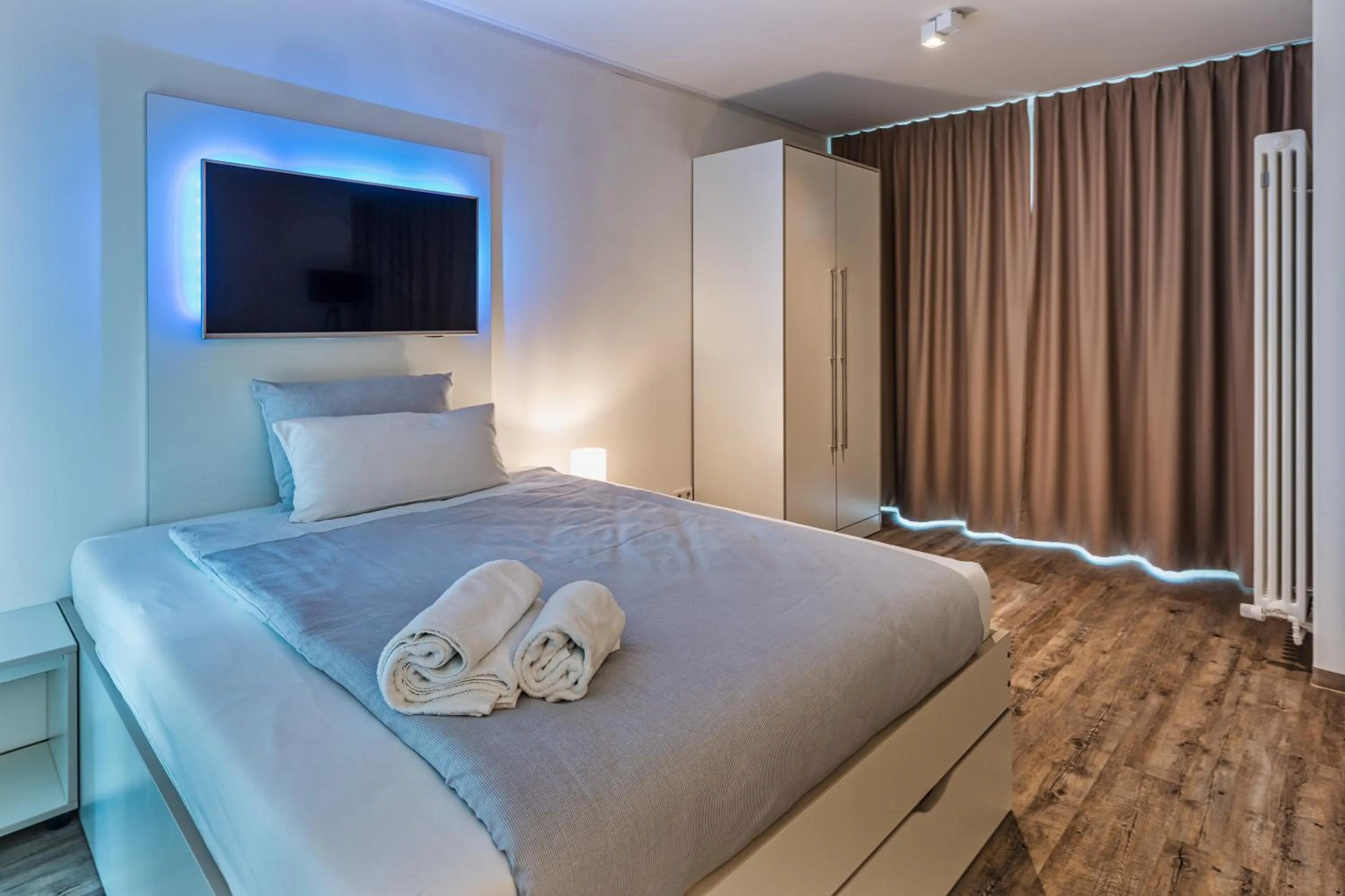 Bed in NorthApartments Dresden am Park