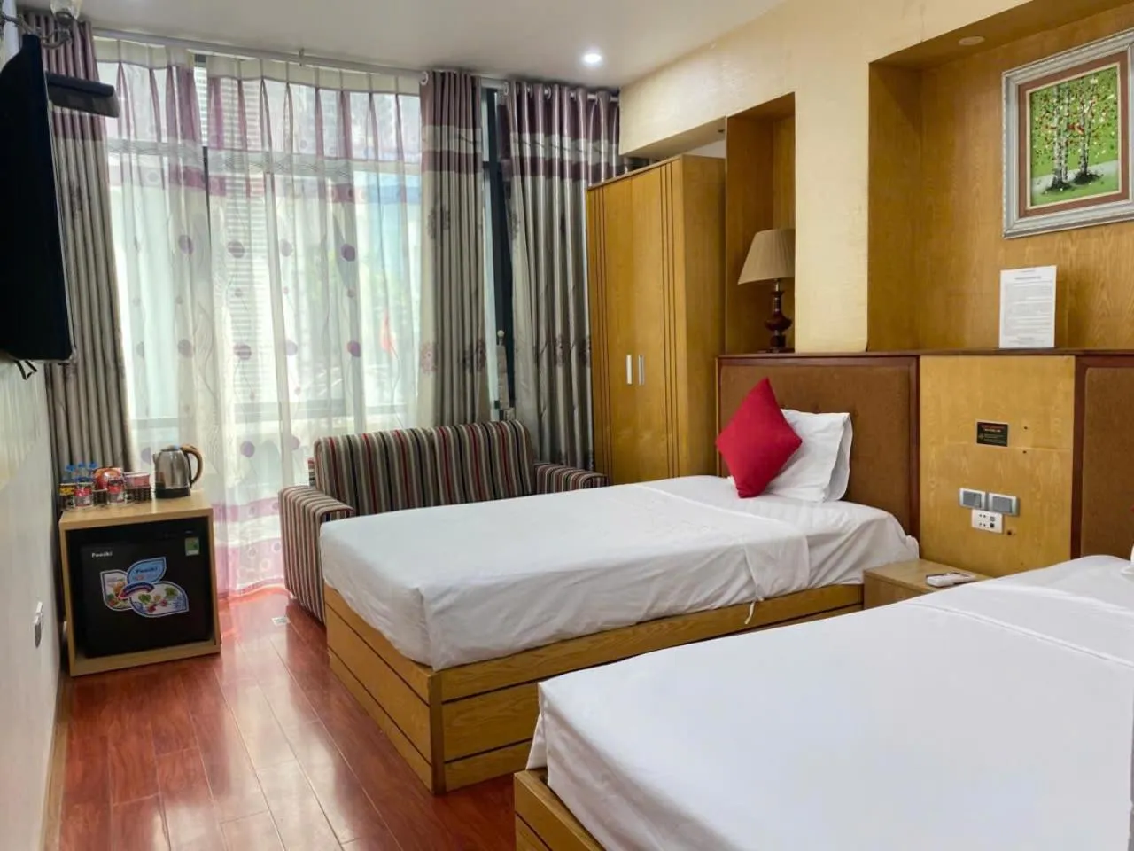 Quiet street view, Bed in Moon Hotel Cau Giay