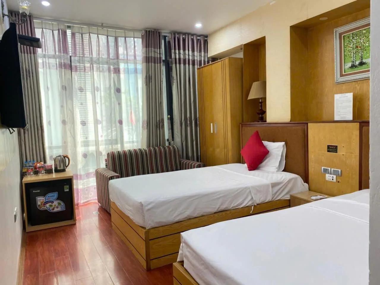 Quiet street view, Bed in Moon Hotel Cau Giay