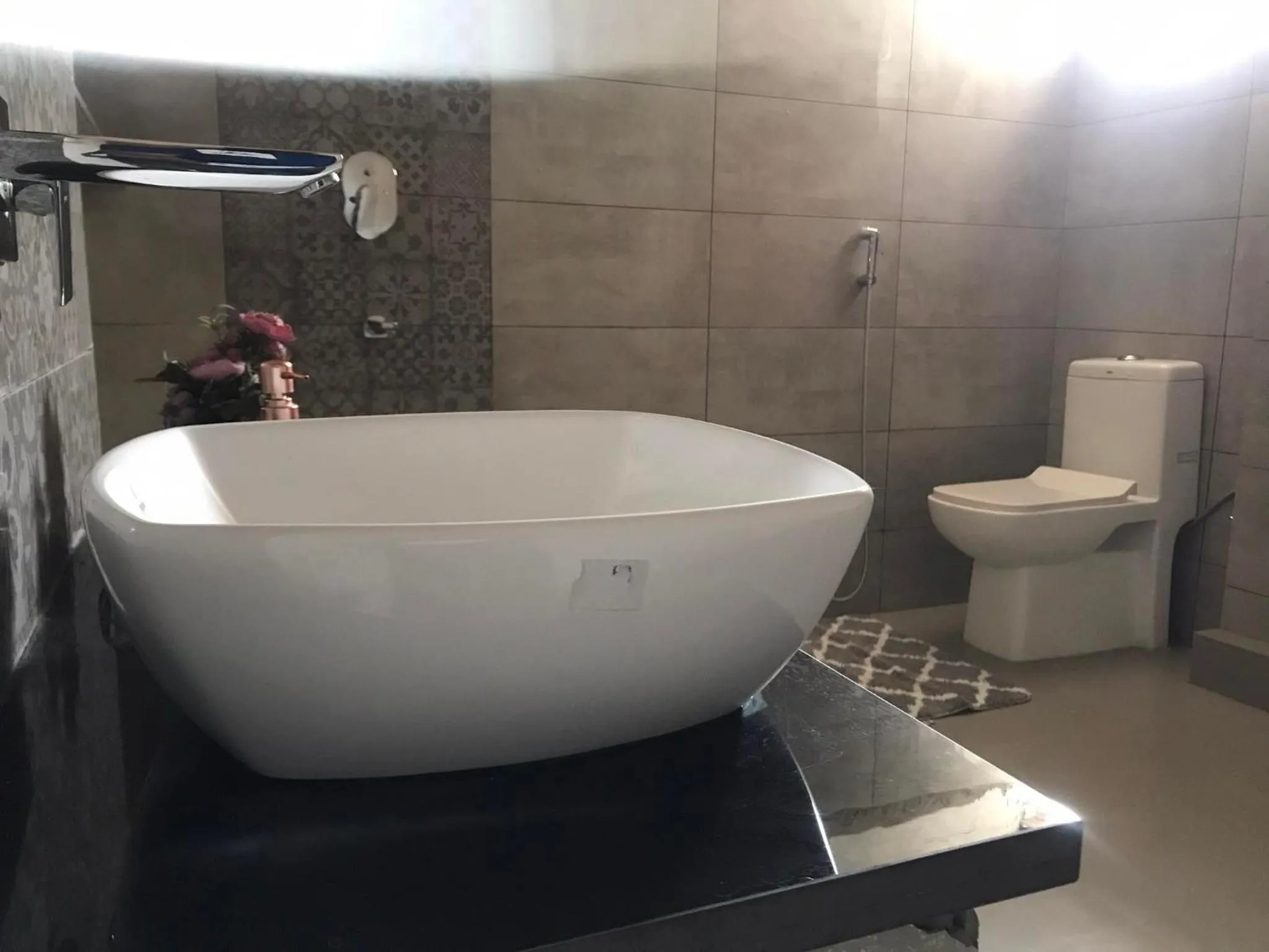 Bathroom in Mariya Condo hotel