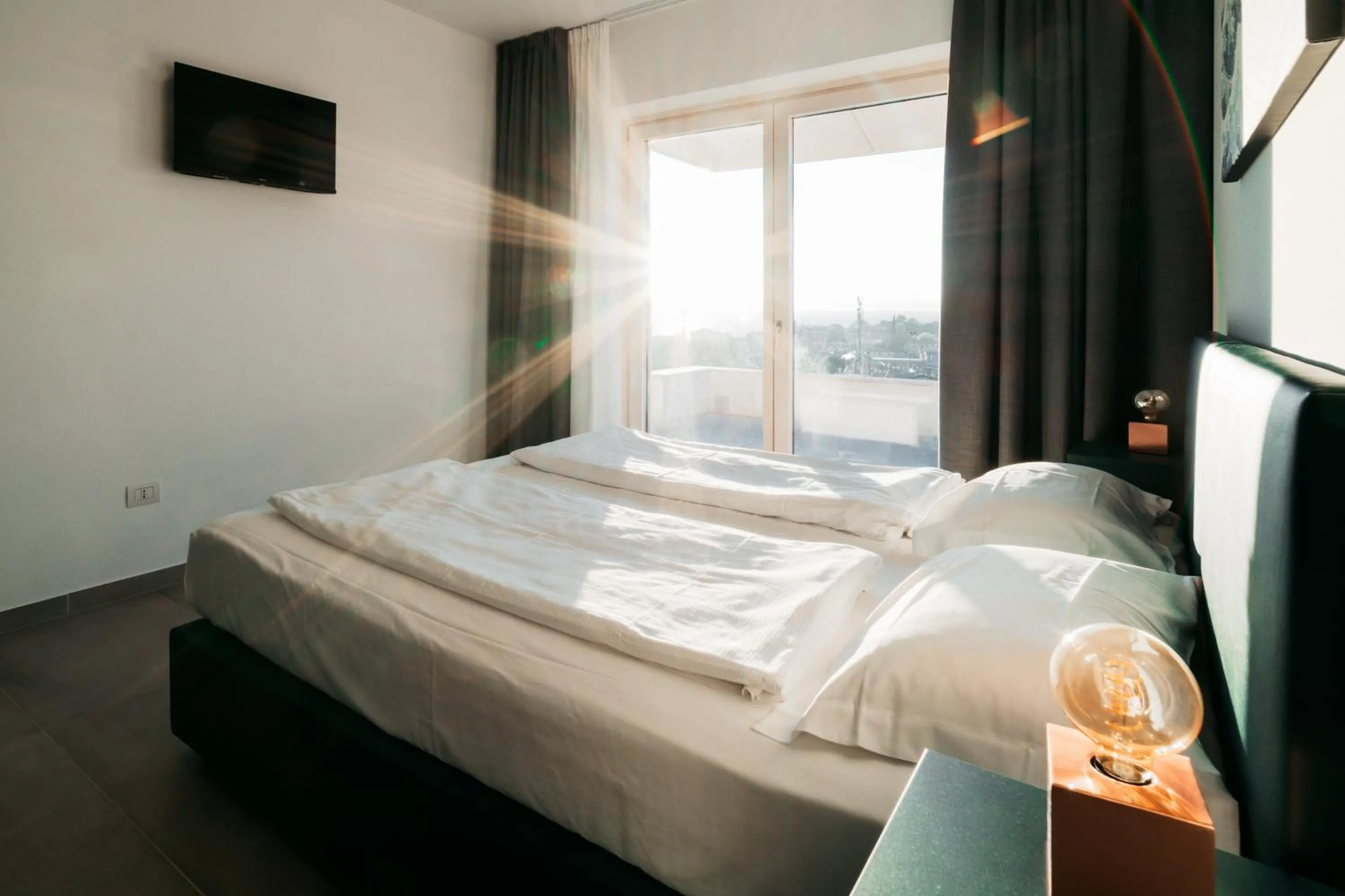 Bed in Apartments Monsurei, Lake view