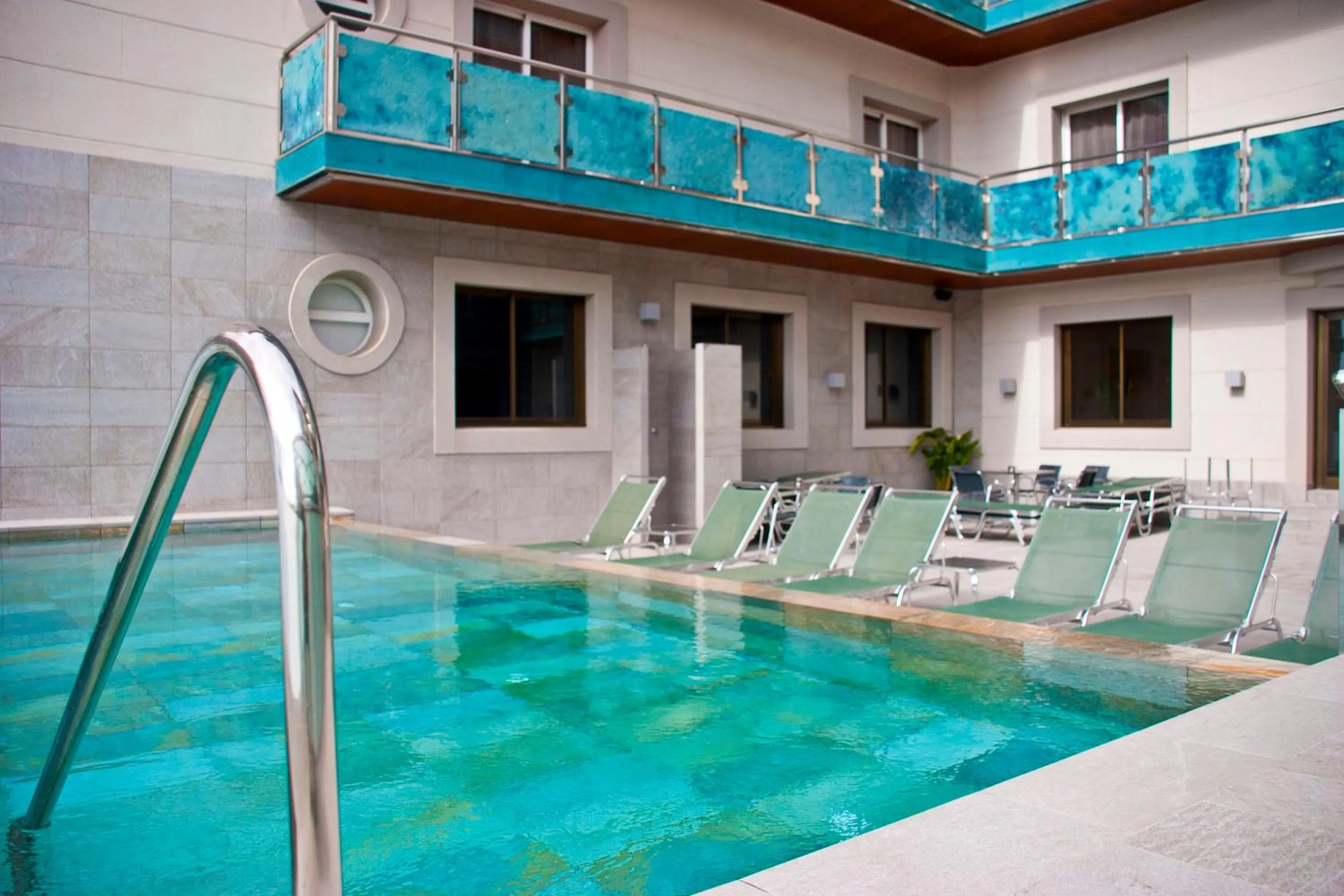 Swimming pool in Sant Jordi Boutique Hotel