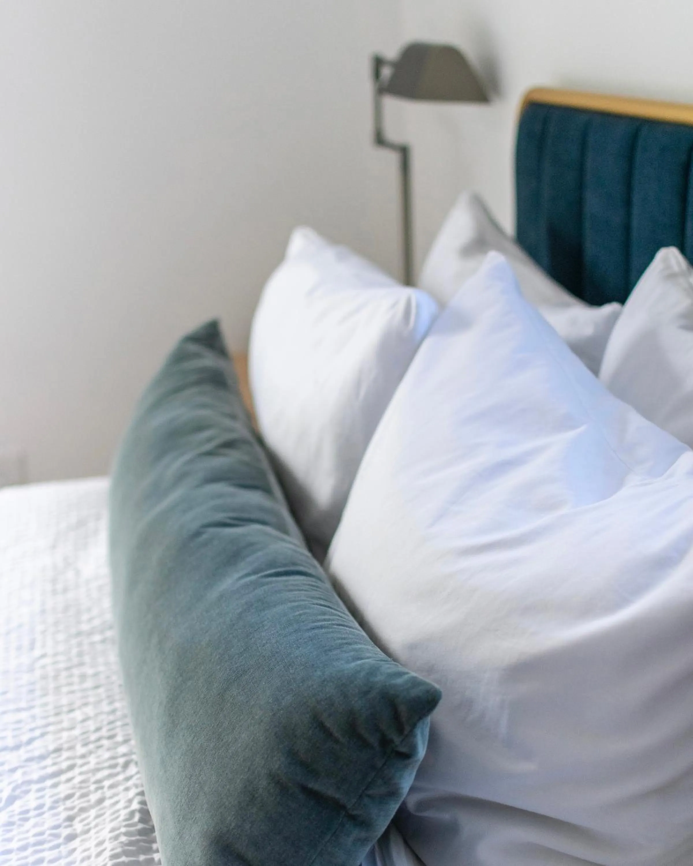 Bed in Launchpoint Lodge