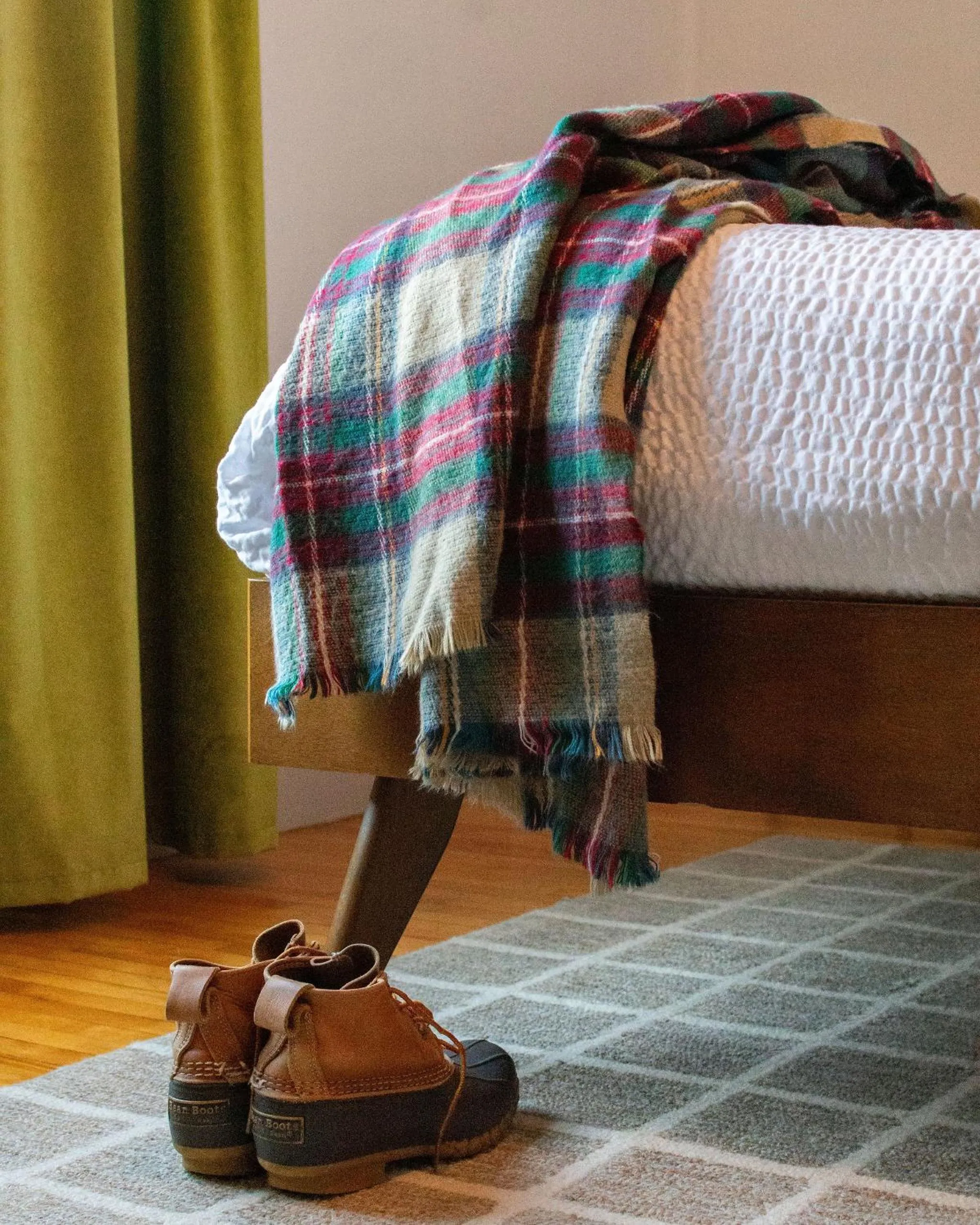 Bed in Launchpoint Lodge