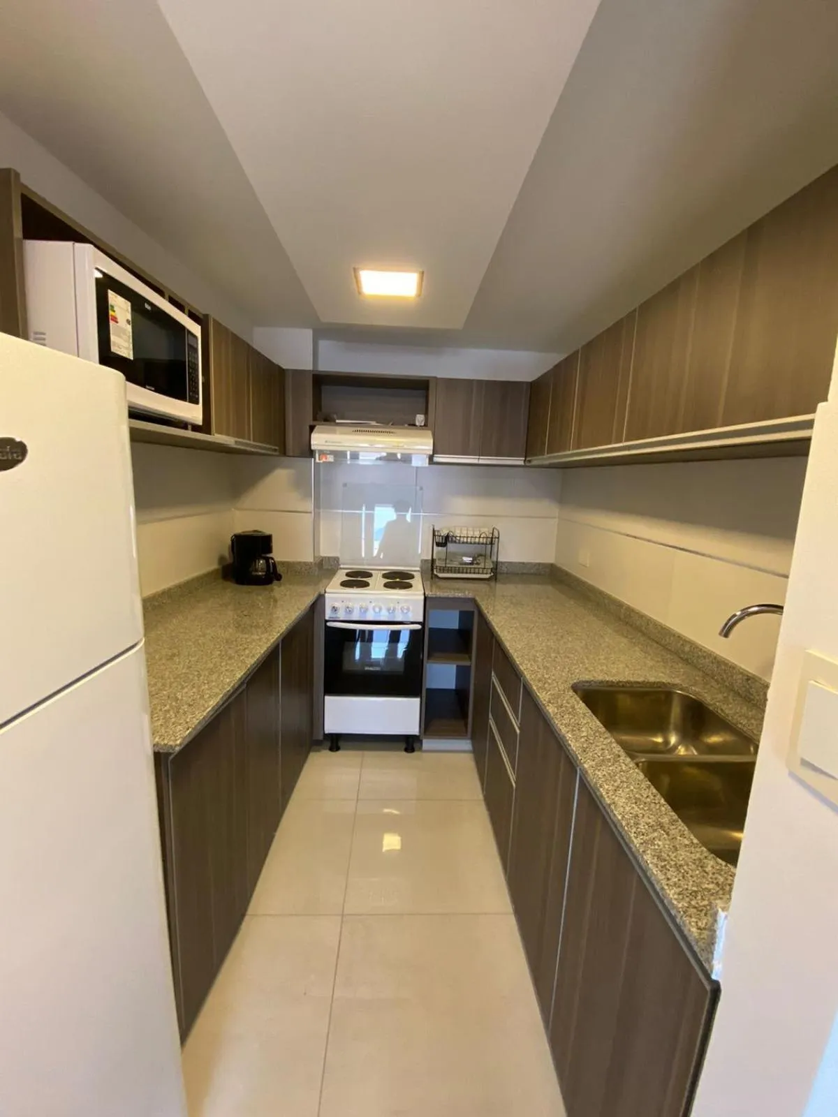 Kitchen or kitchenette in HOMEFULL Apartamentos