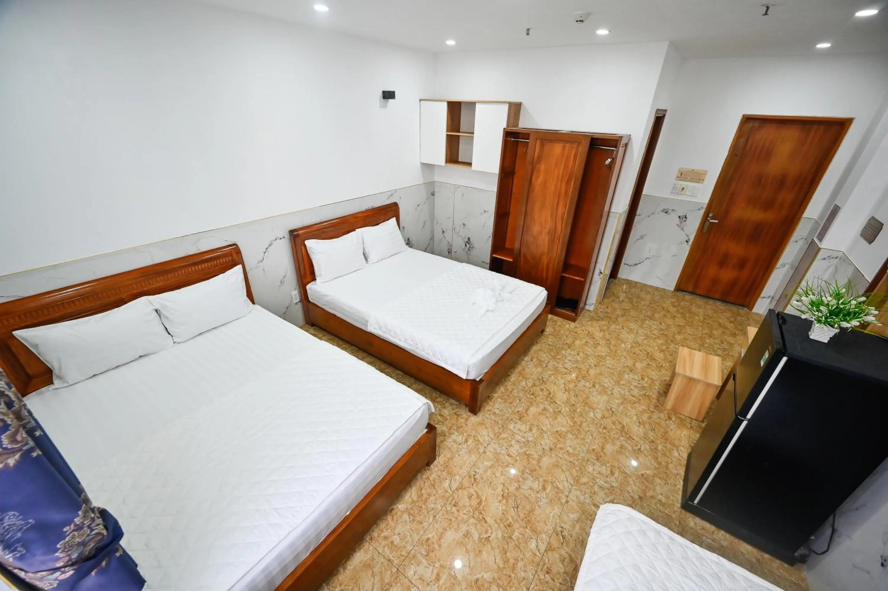 Bed in Yoyo Airport Saigon Hotel