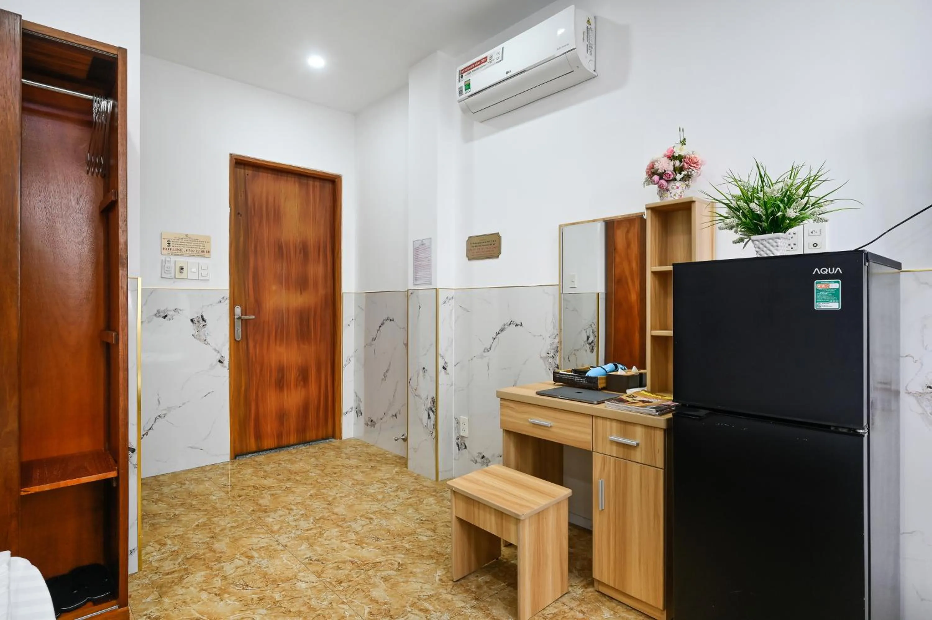 wardrobe in Yoyo Airport Saigon Hotel