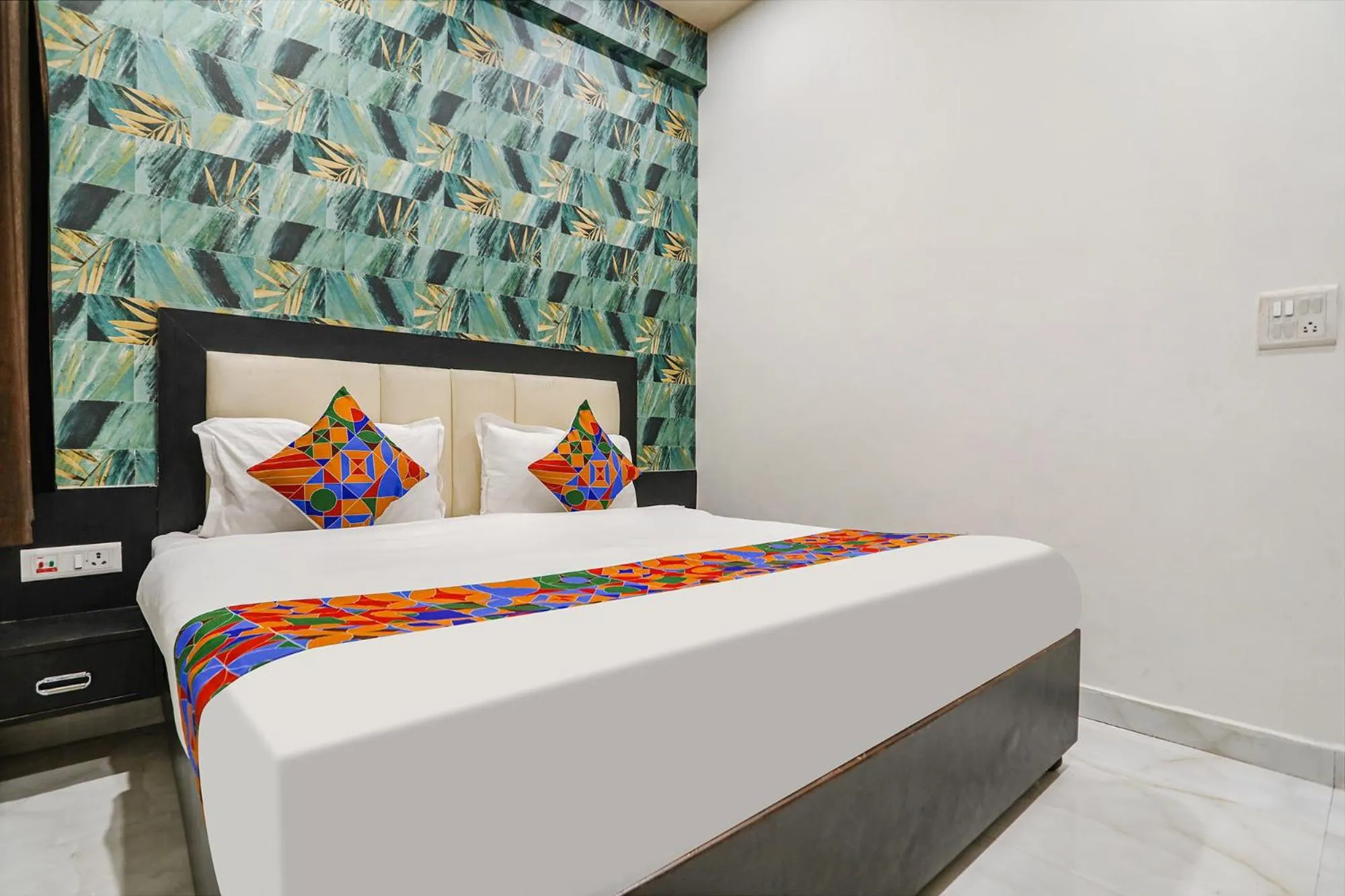 Bed in FabHotel Aaradhya Residency
