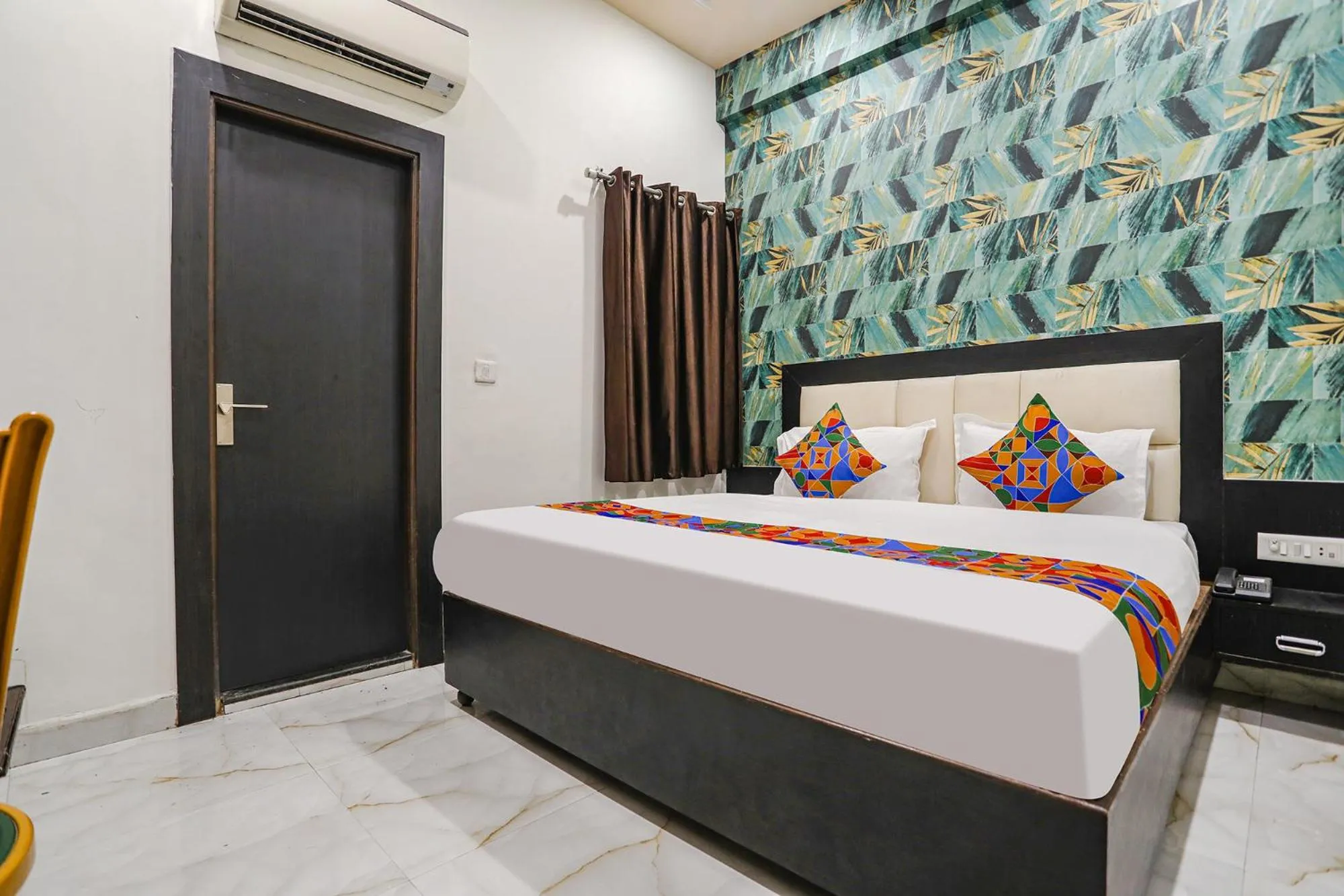 Bed in FabHotel Aaradhya Residency