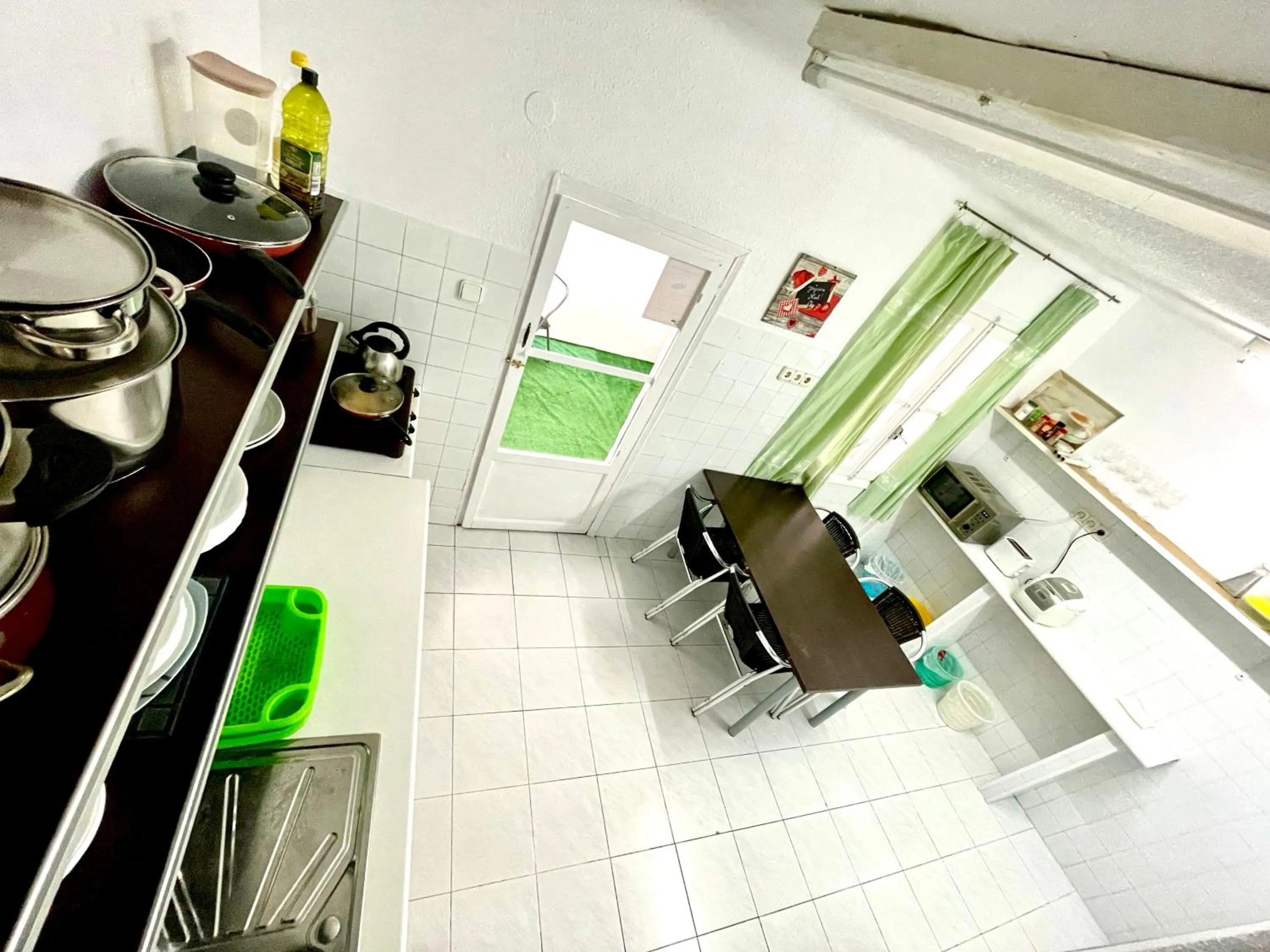 Kitchen or kitchenette in Las habitaciones en Alicante