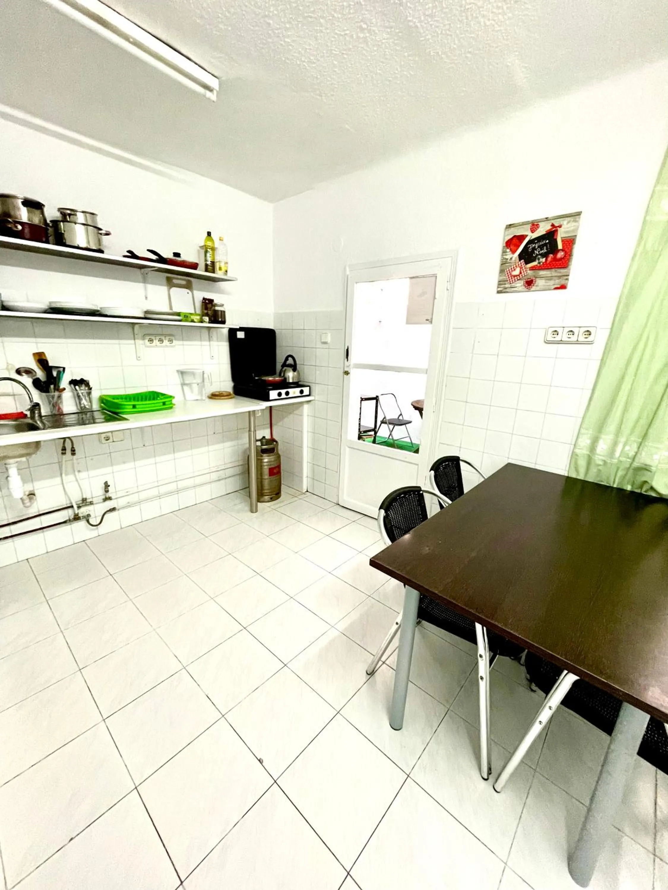 Kitchen or kitchenette in Las habitaciones en Alicante