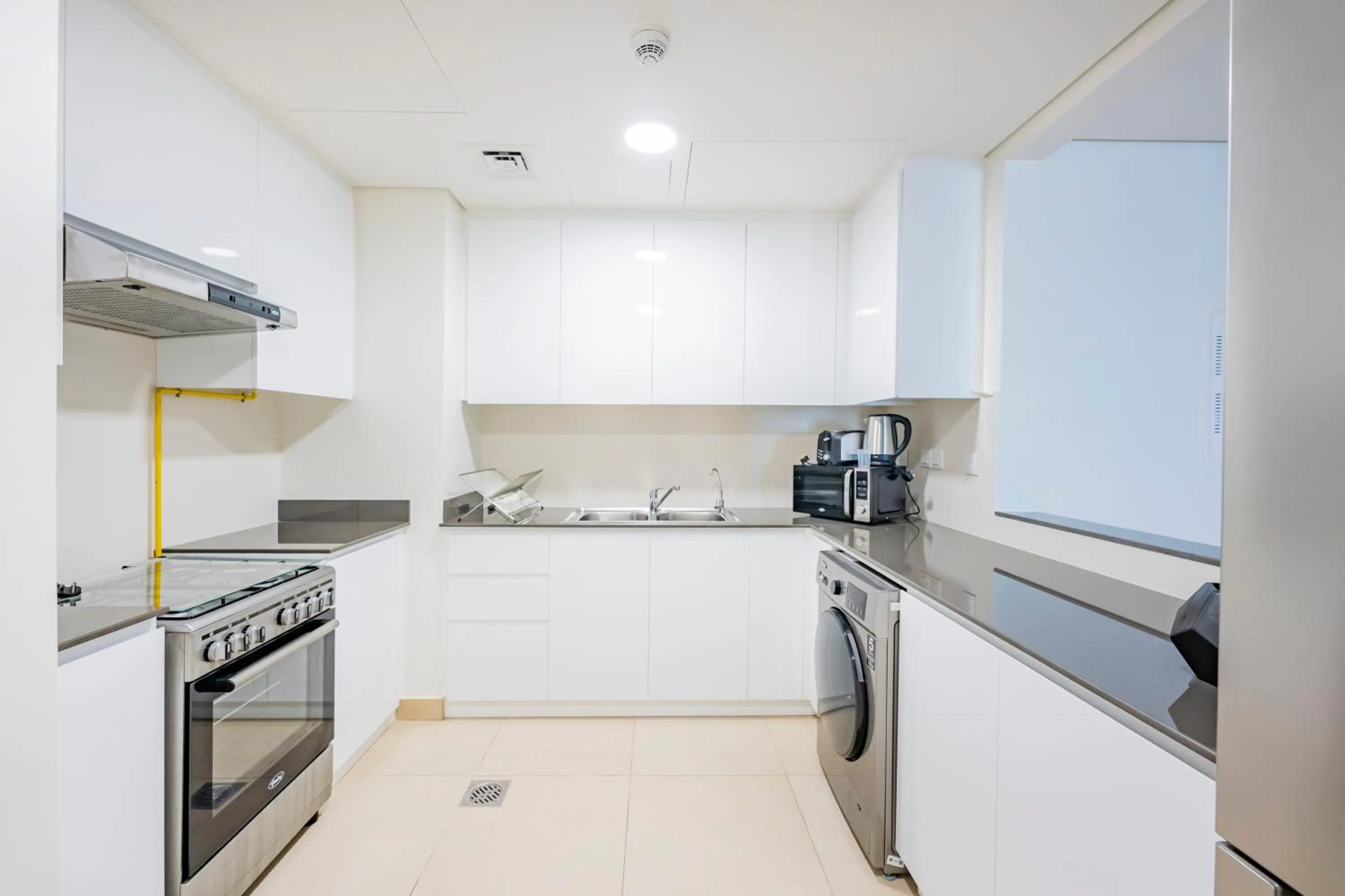 Kitchen or kitchenette in Expo Village Serviced Apartments
