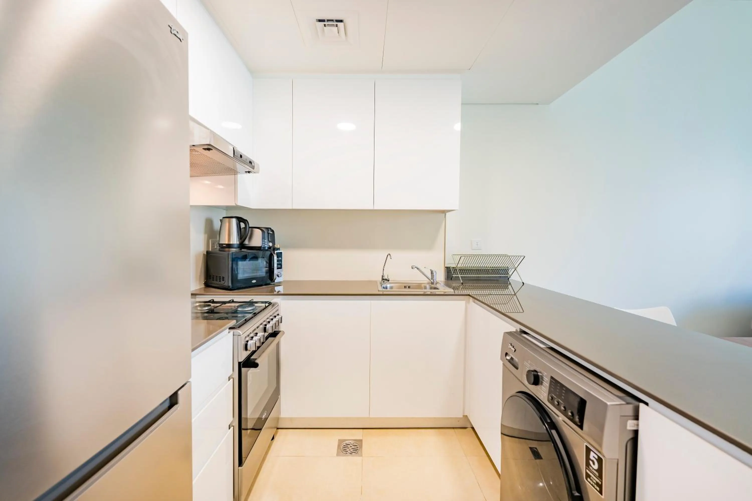 Kitchen or kitchenette in Expo Village Serviced Apartments