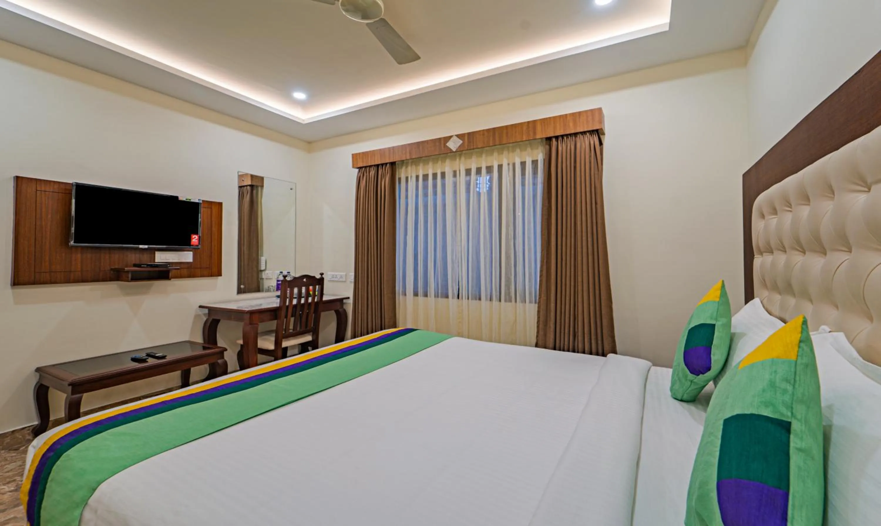 Bed in Treebo Aaravi Residency, 800 Mtrs From Promenade Beach