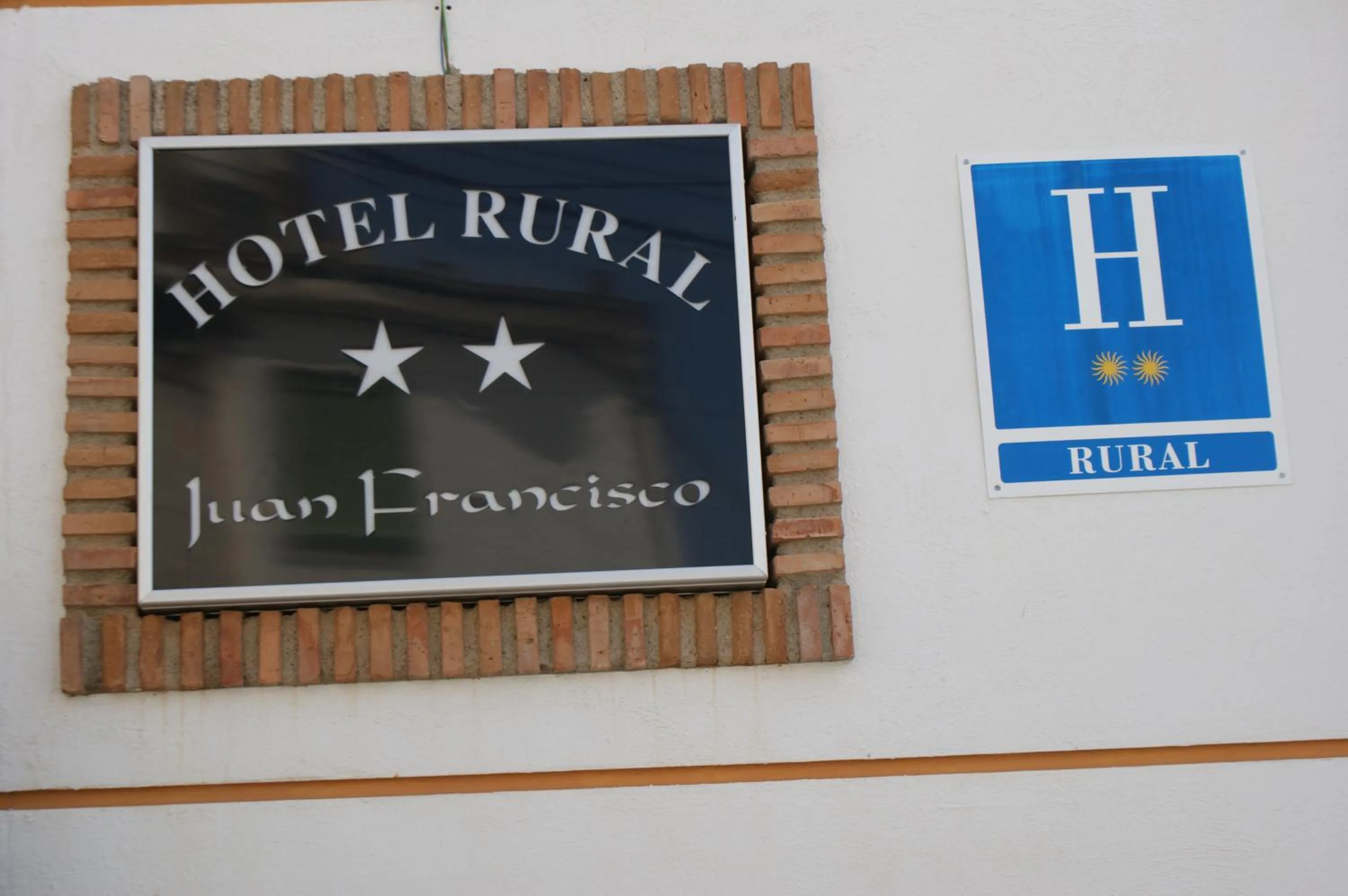 Property logo or sign in Hotel Juan Francisco