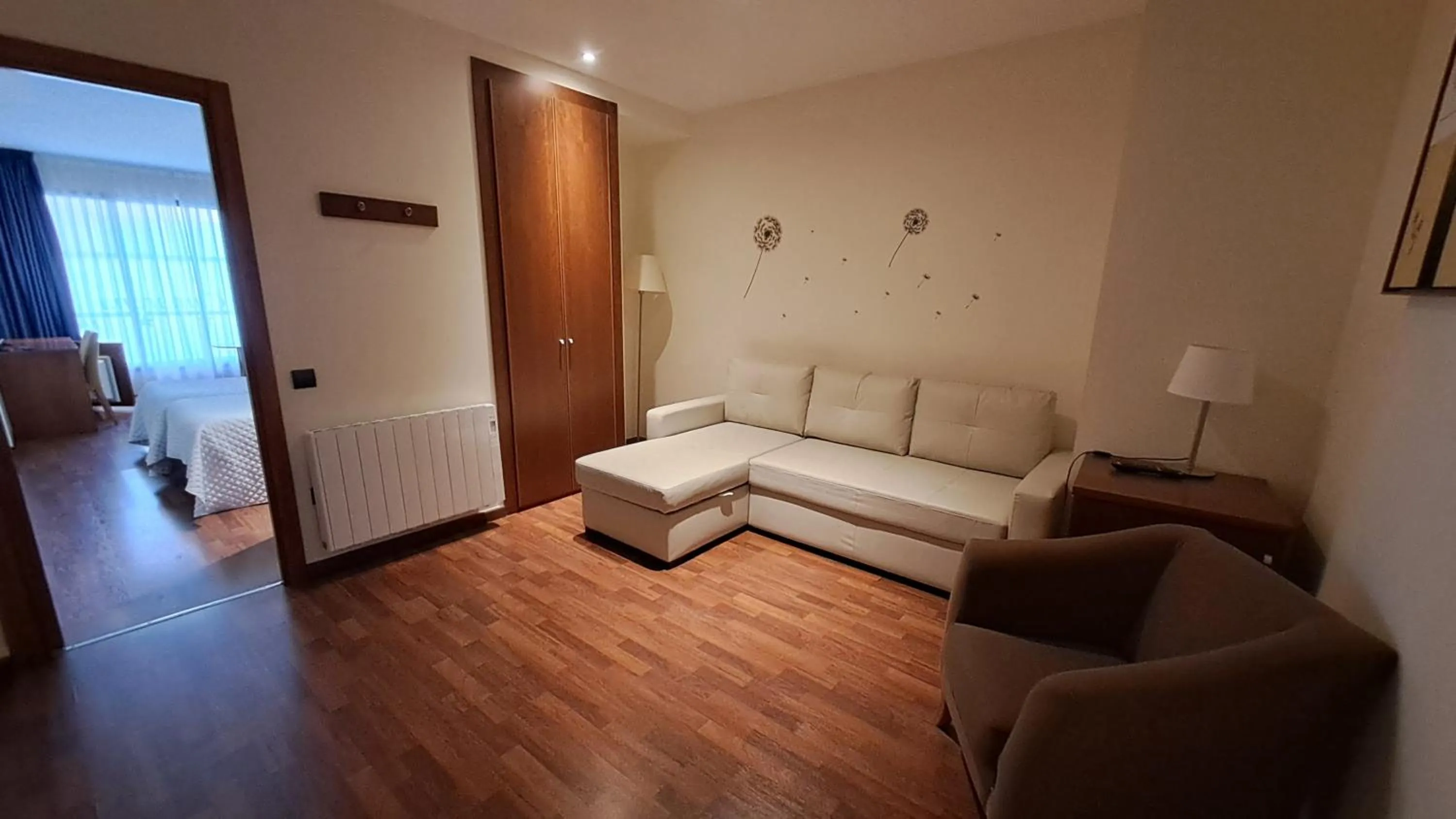 Living room, Bed in Hotel Suite Camarena