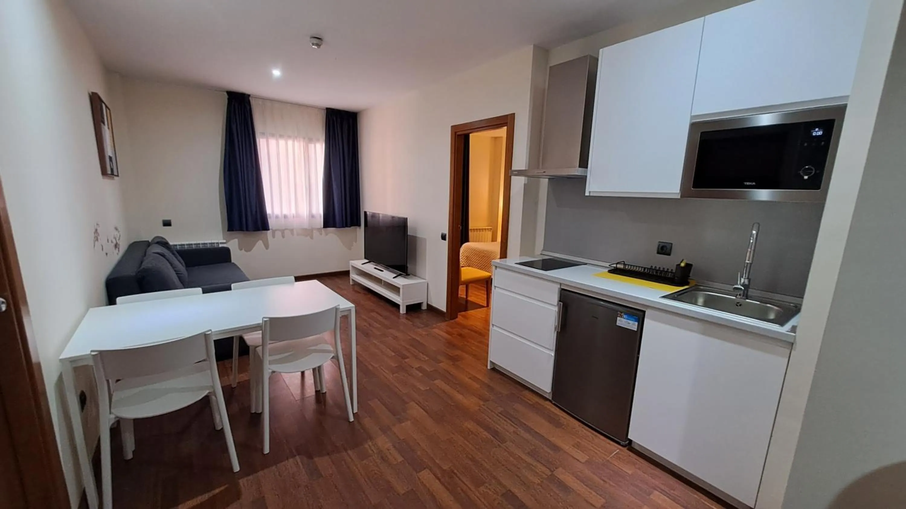 Kitchen or kitchenette in Hotel Suite Camarena