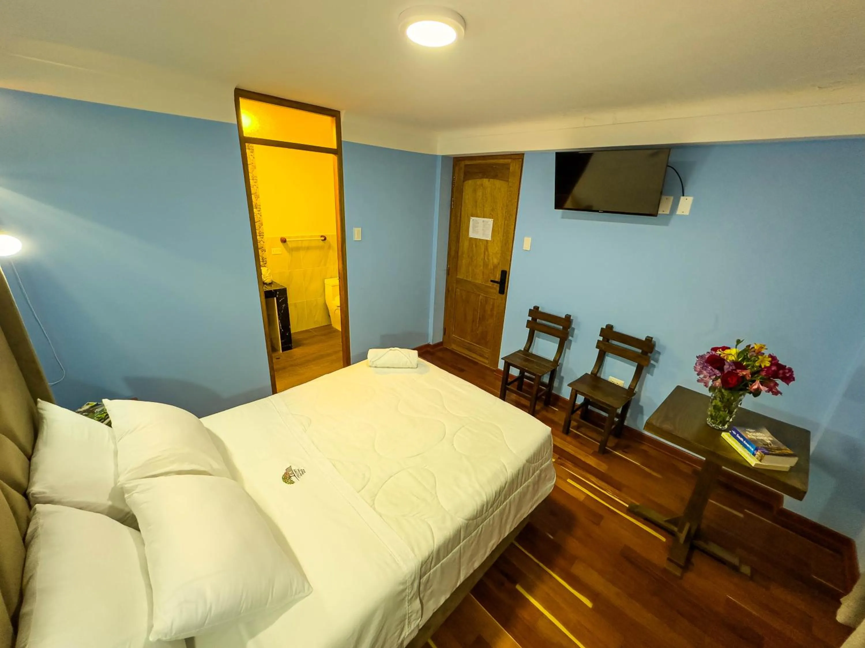 Bed in Pisonay Hotel