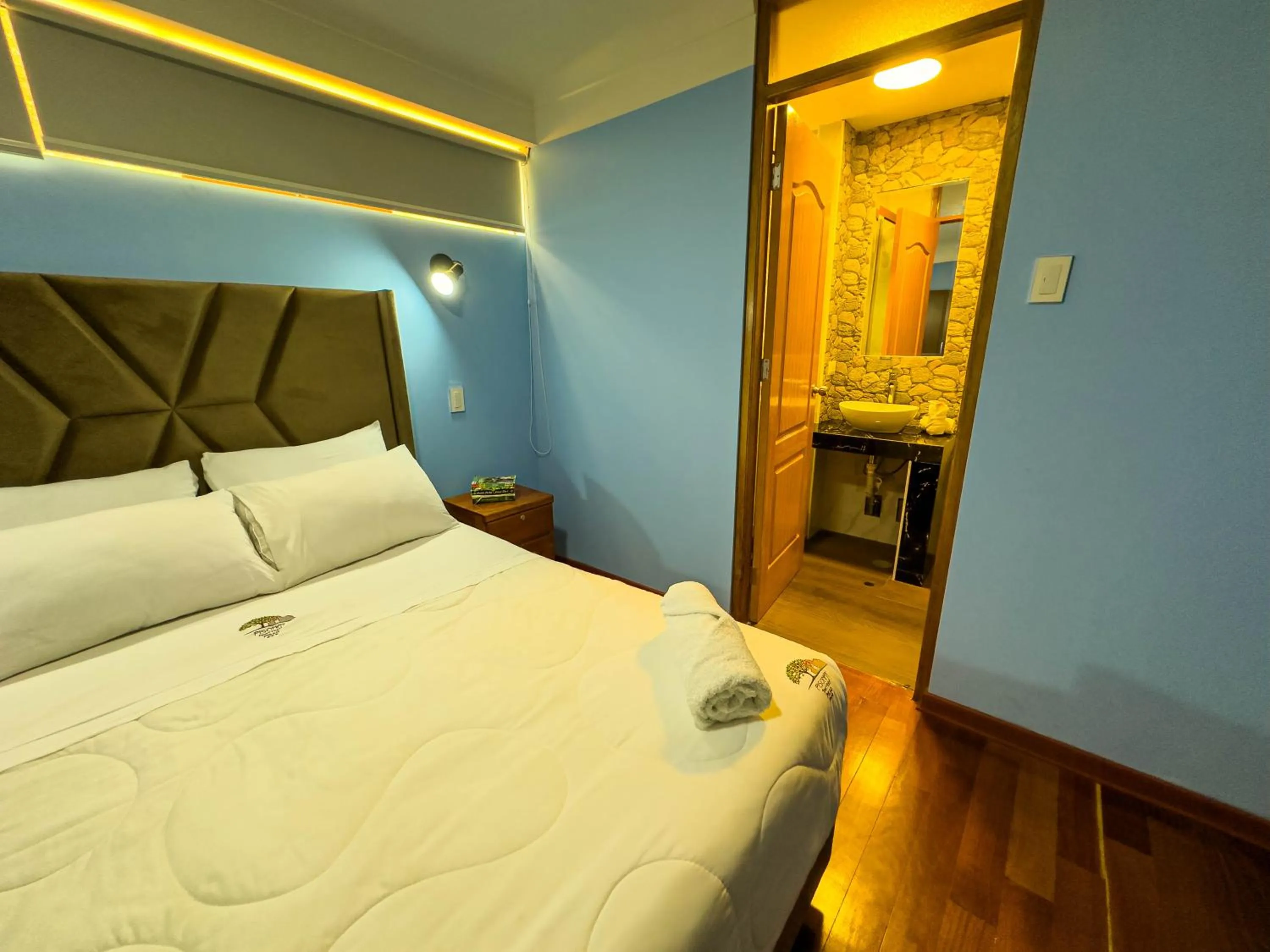 Bed in Pisonay Hotel