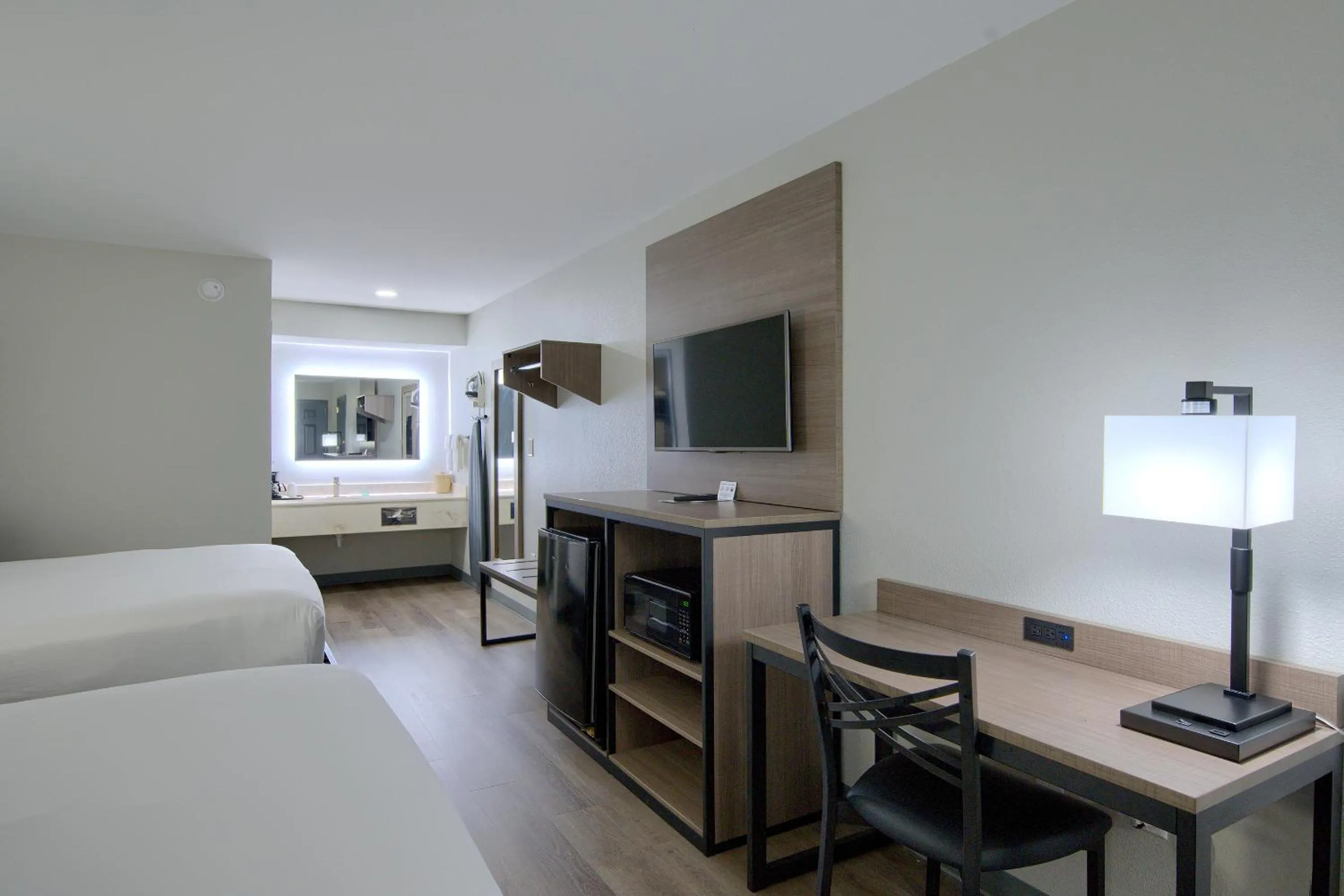 Photo of the whole room, Bed in Hot Springs Village Inn