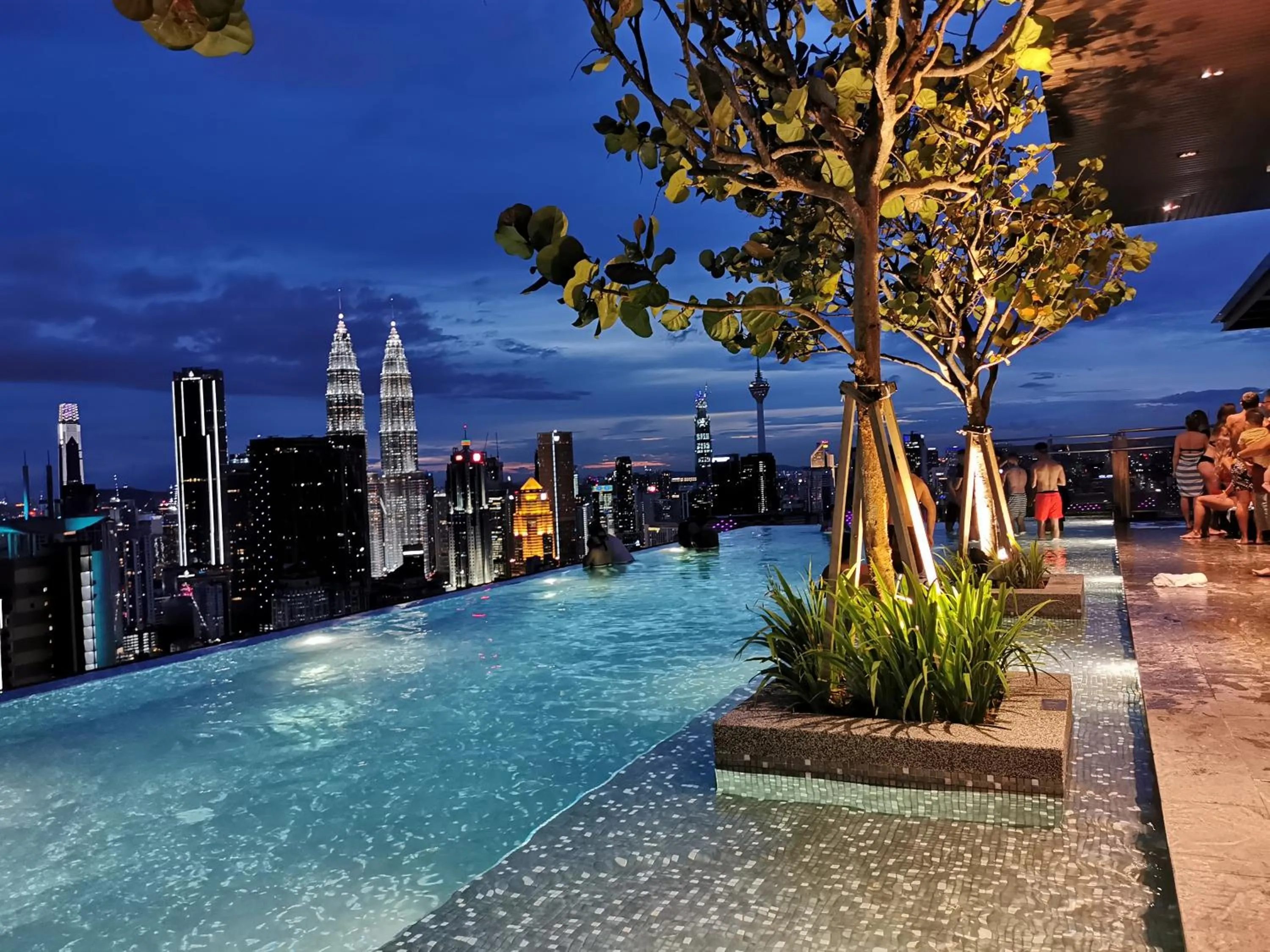 Swimming pool in Expressionz Professional Suites by AURORA SUMMER SUITES