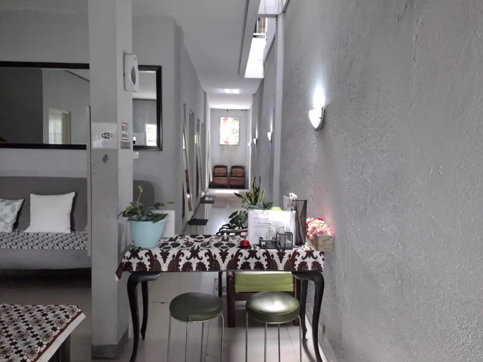 Living room, Bed in UNIK Guest House Syariah