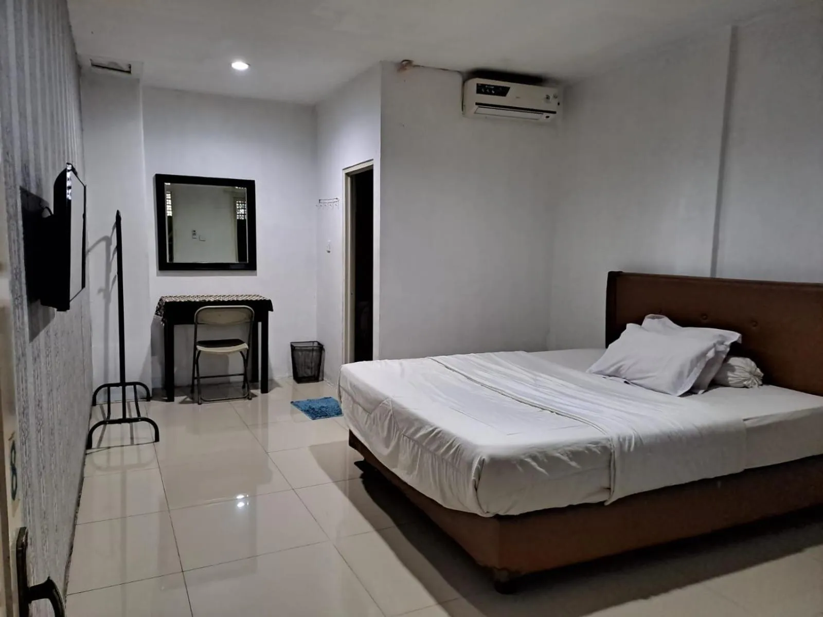 Photo of the whole room, Bed in UNIK Guest House Syariah