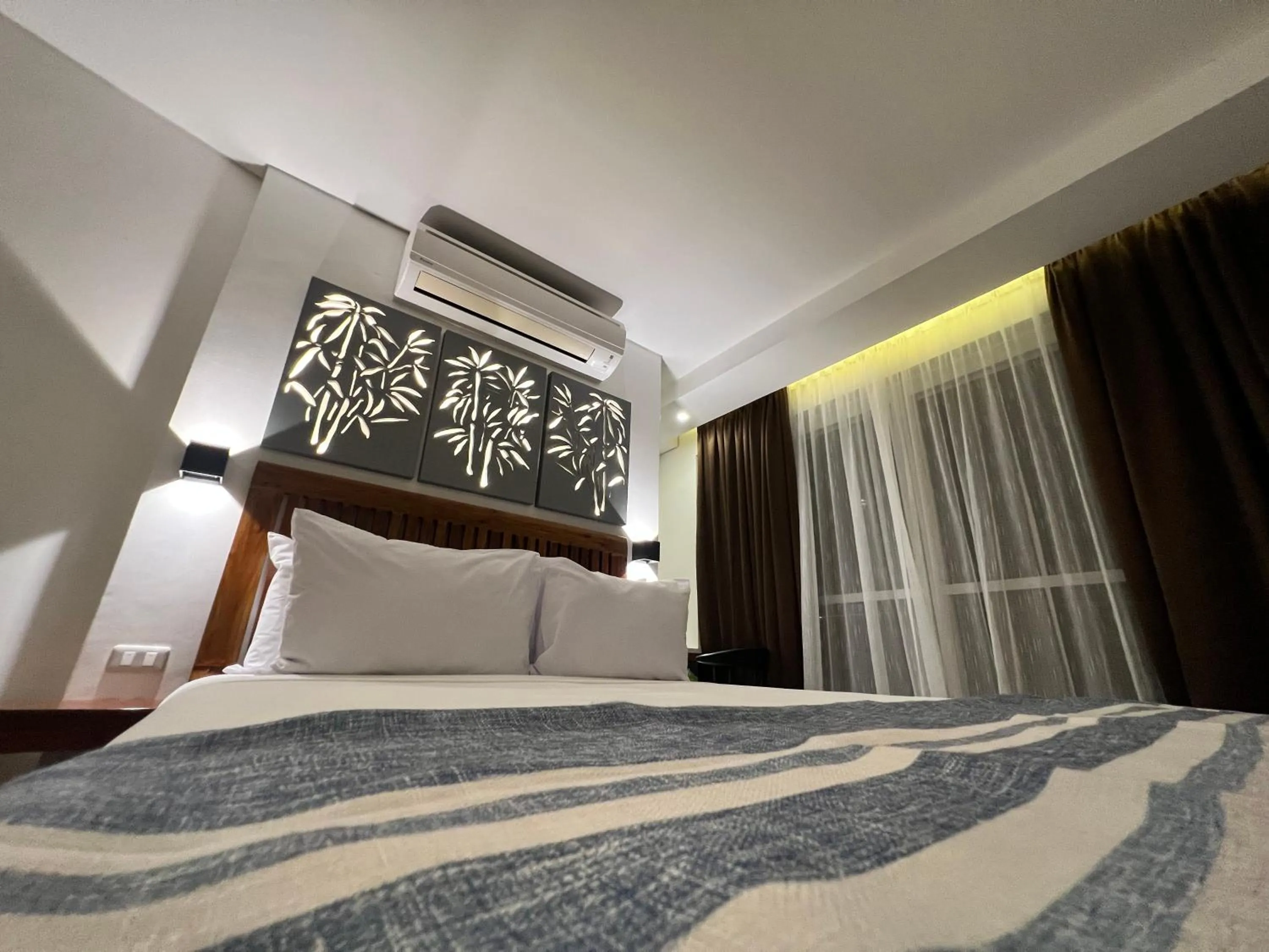 Bed in Aira Boracay Hotel