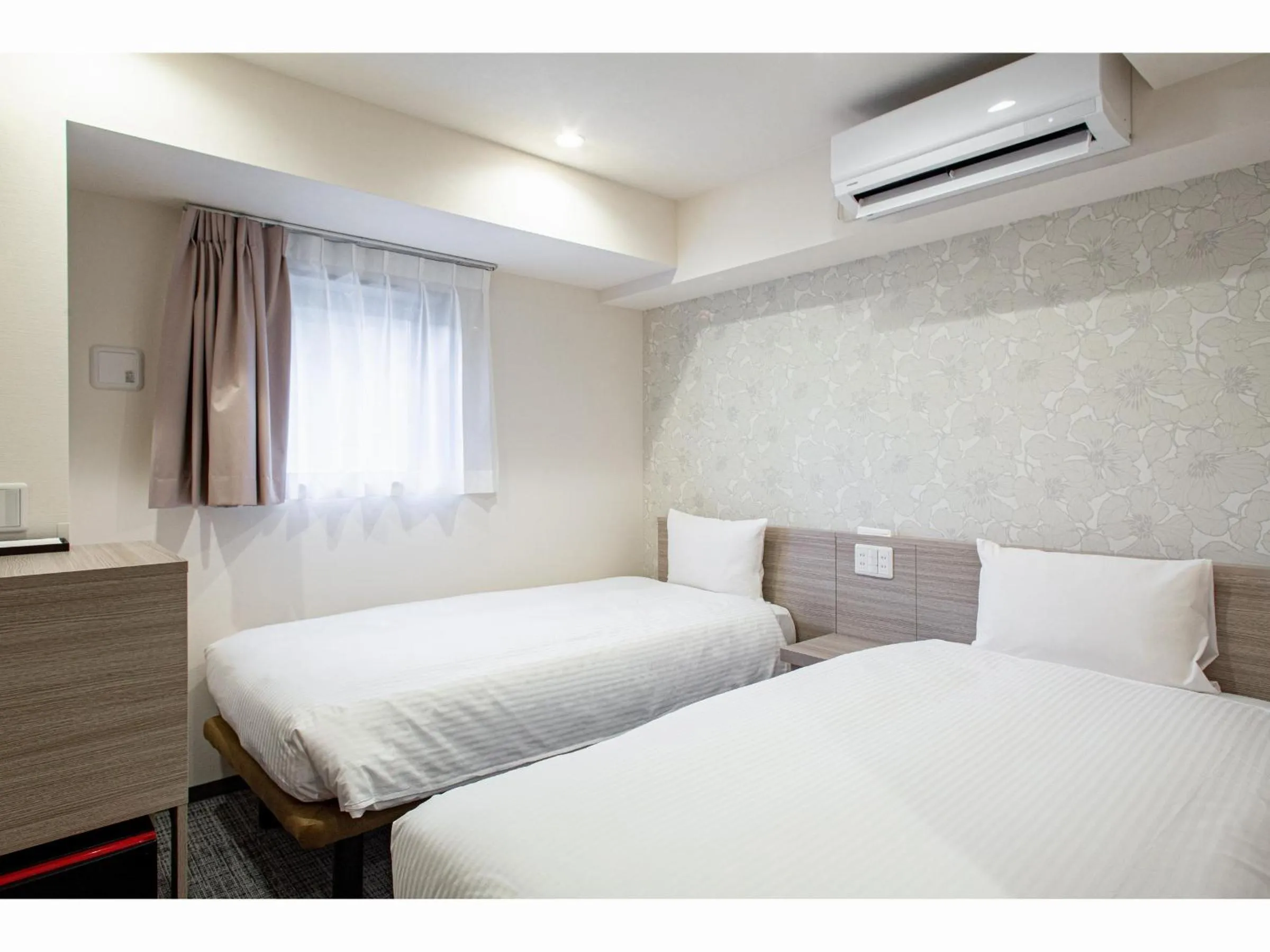 Bed in Kuretake Inn Premium Tajimi Ekimae